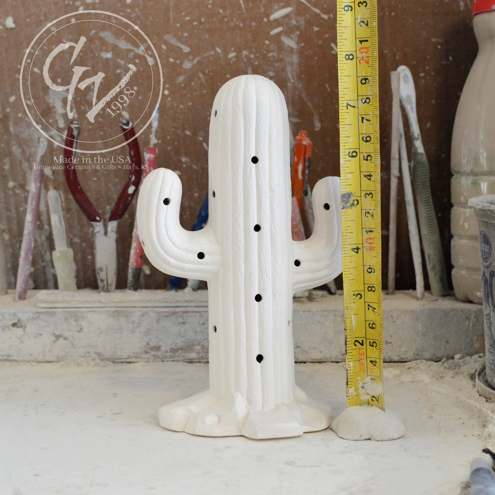 Front view of the 7.5-inch unfired ceramic cactus showing its wide-arm profile and smooth finish.