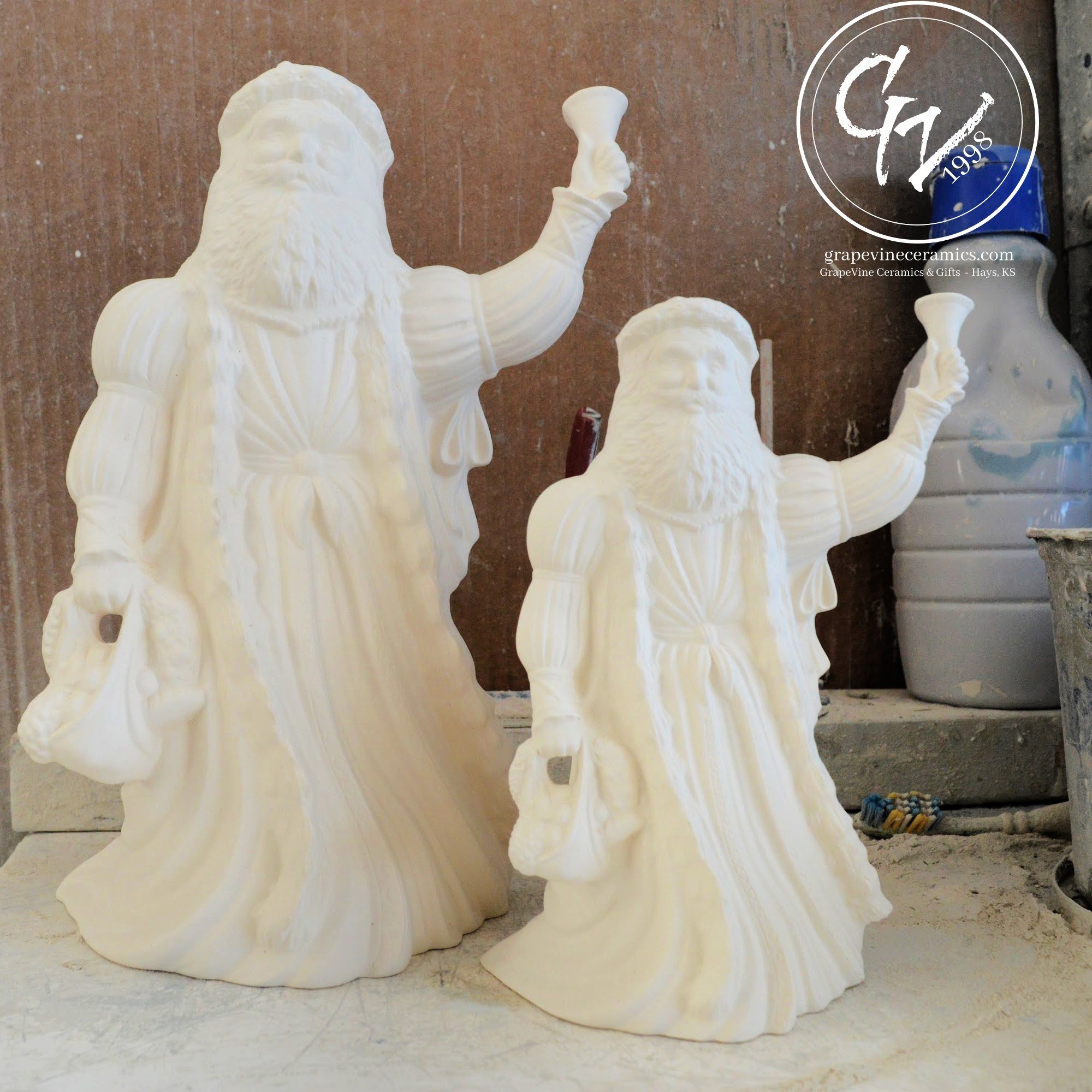 Pair of English Santas showing the different sizes available.