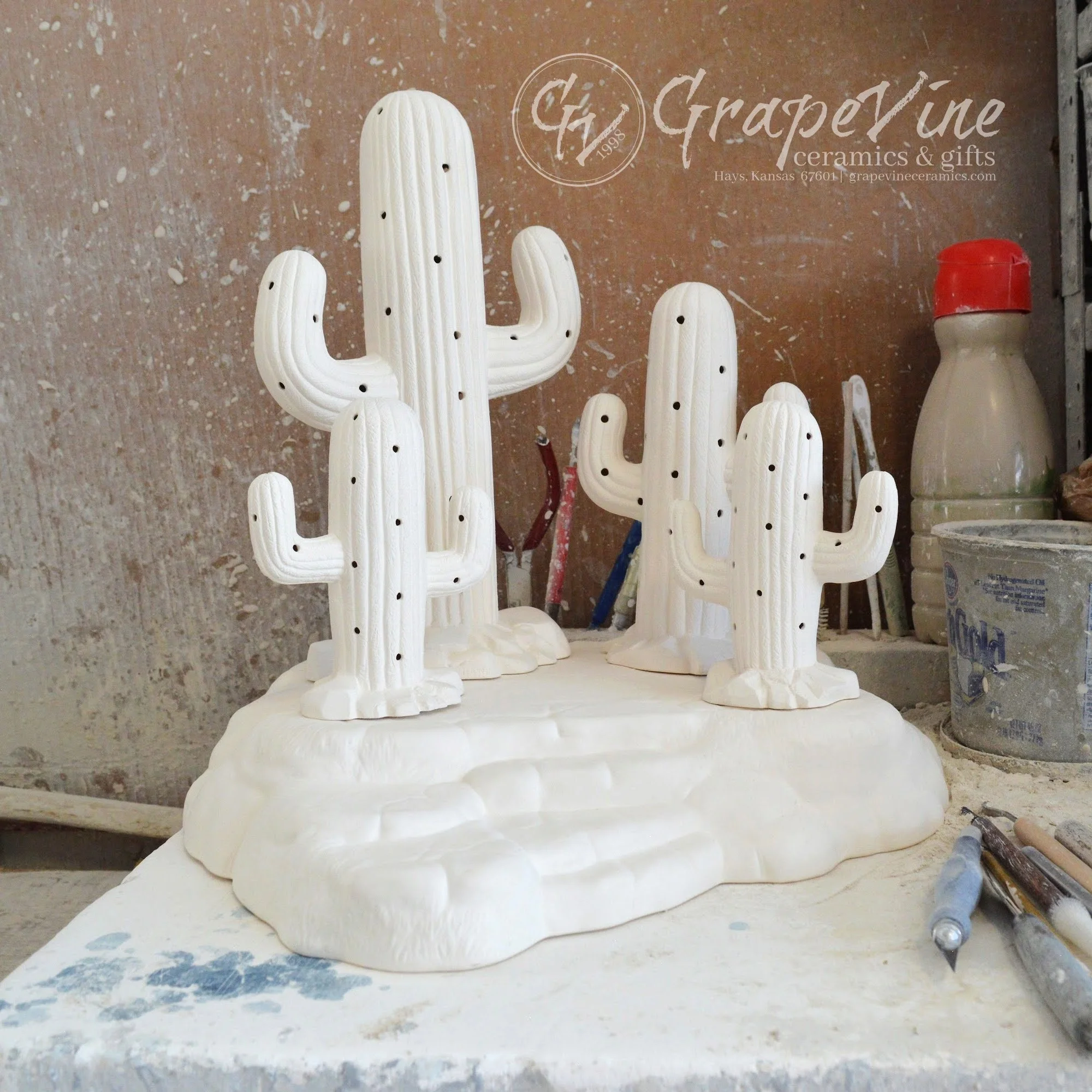 Group photo including Side angle profile Unpainted white ceramic Saguaro Cactus bisque, 7.5 inches tall, professionally cleaned and ready to paint.