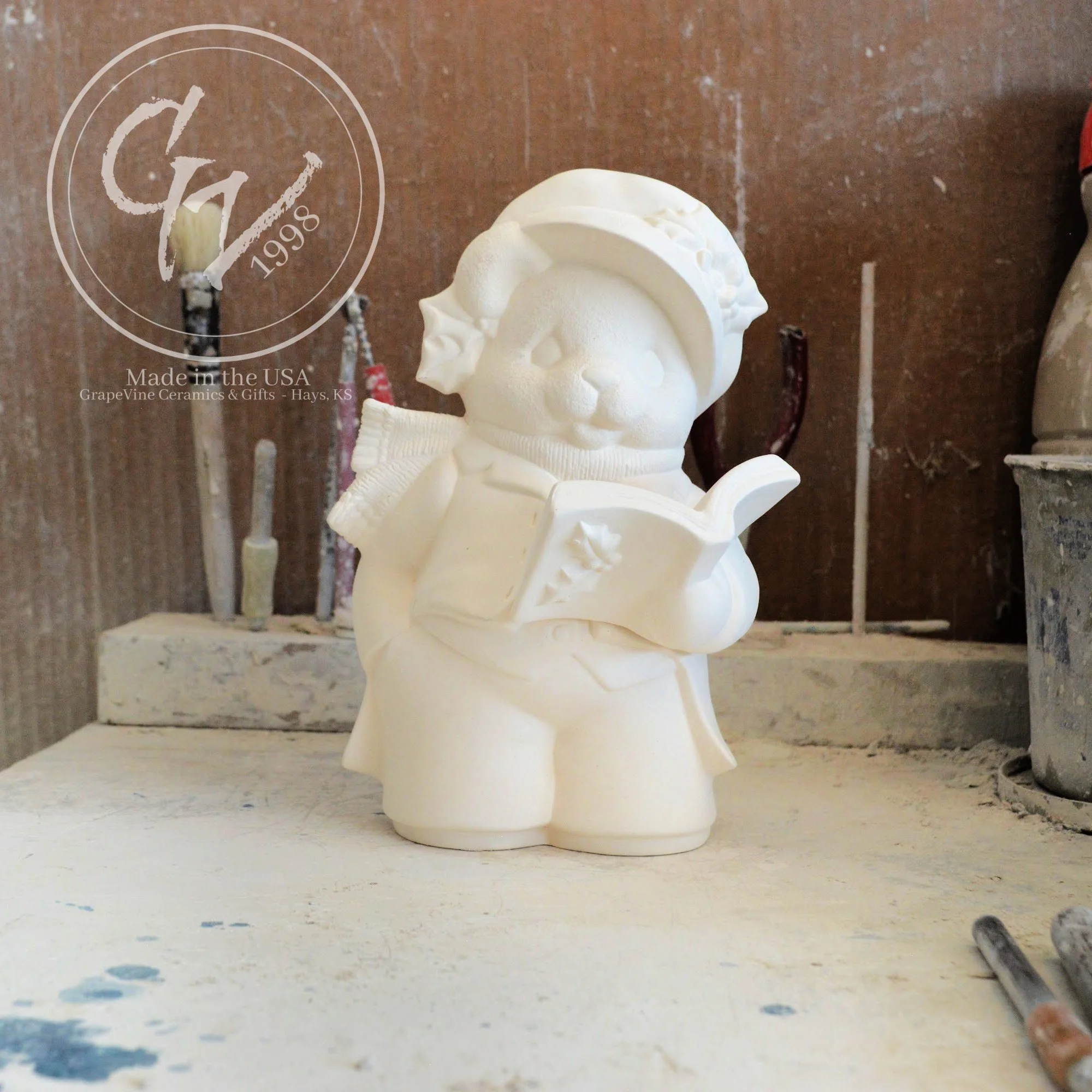Unpainted white ceramic bisque Boy Christmas Bear figurine by Clay Magic 1253, 7.5 inches tall.