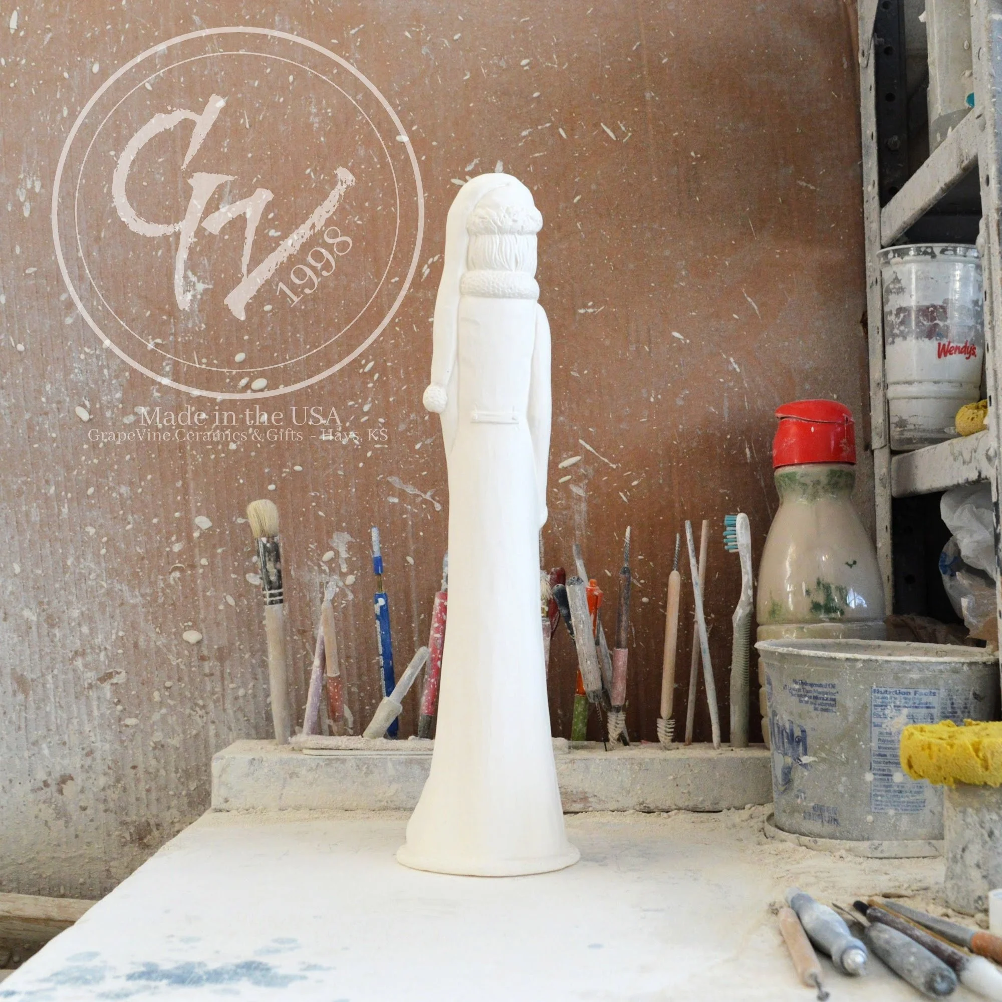 Rear view of the unpainted white ceramic bisque Scioto S-2272 Thin Santa with Stars, 16 inches tall, professionally cleaned and ready to paint