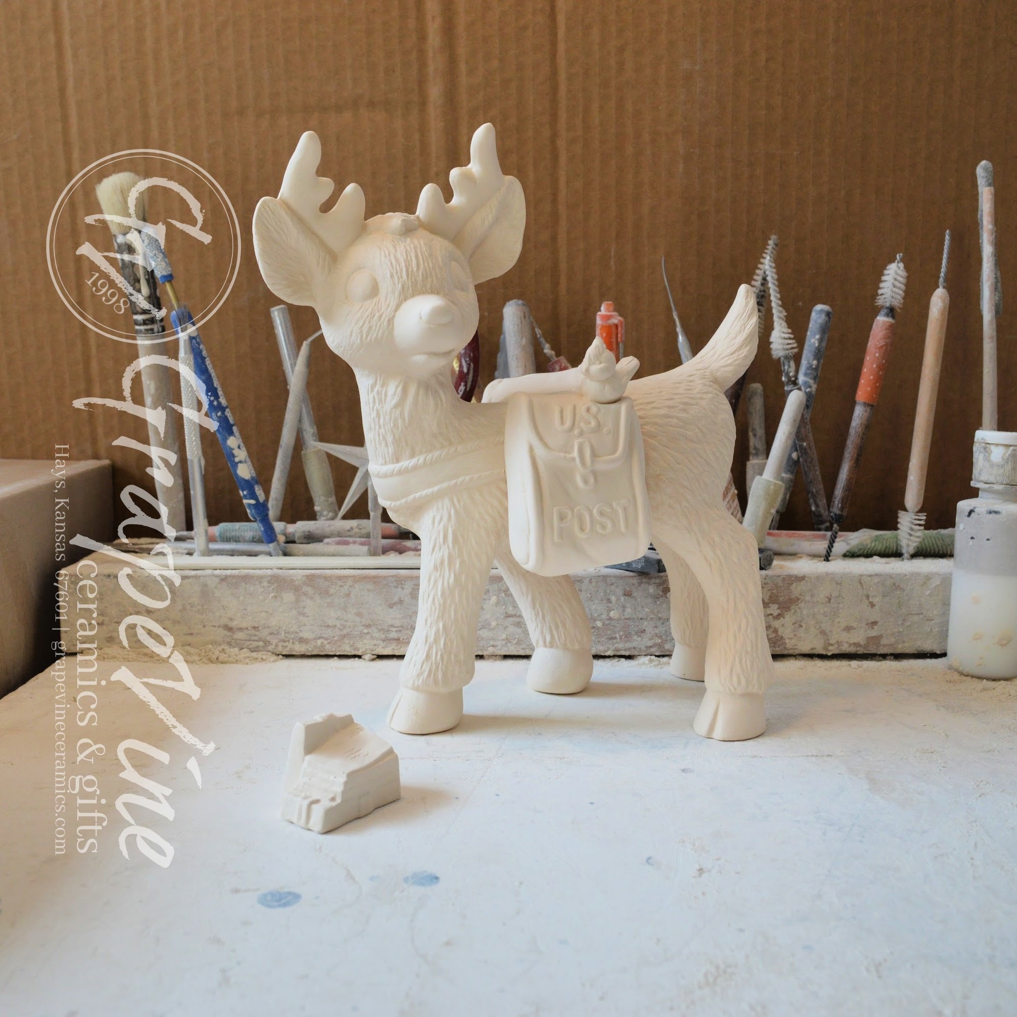 Vintage‑style holiday ceramic bisque – Reindeer Postman