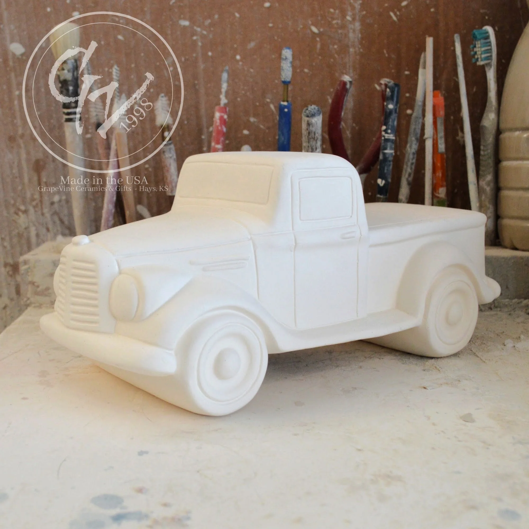 Unpainted white ceramic jalopy pickup truck bisque, Clay Magic 4208, ready for DIY painting.