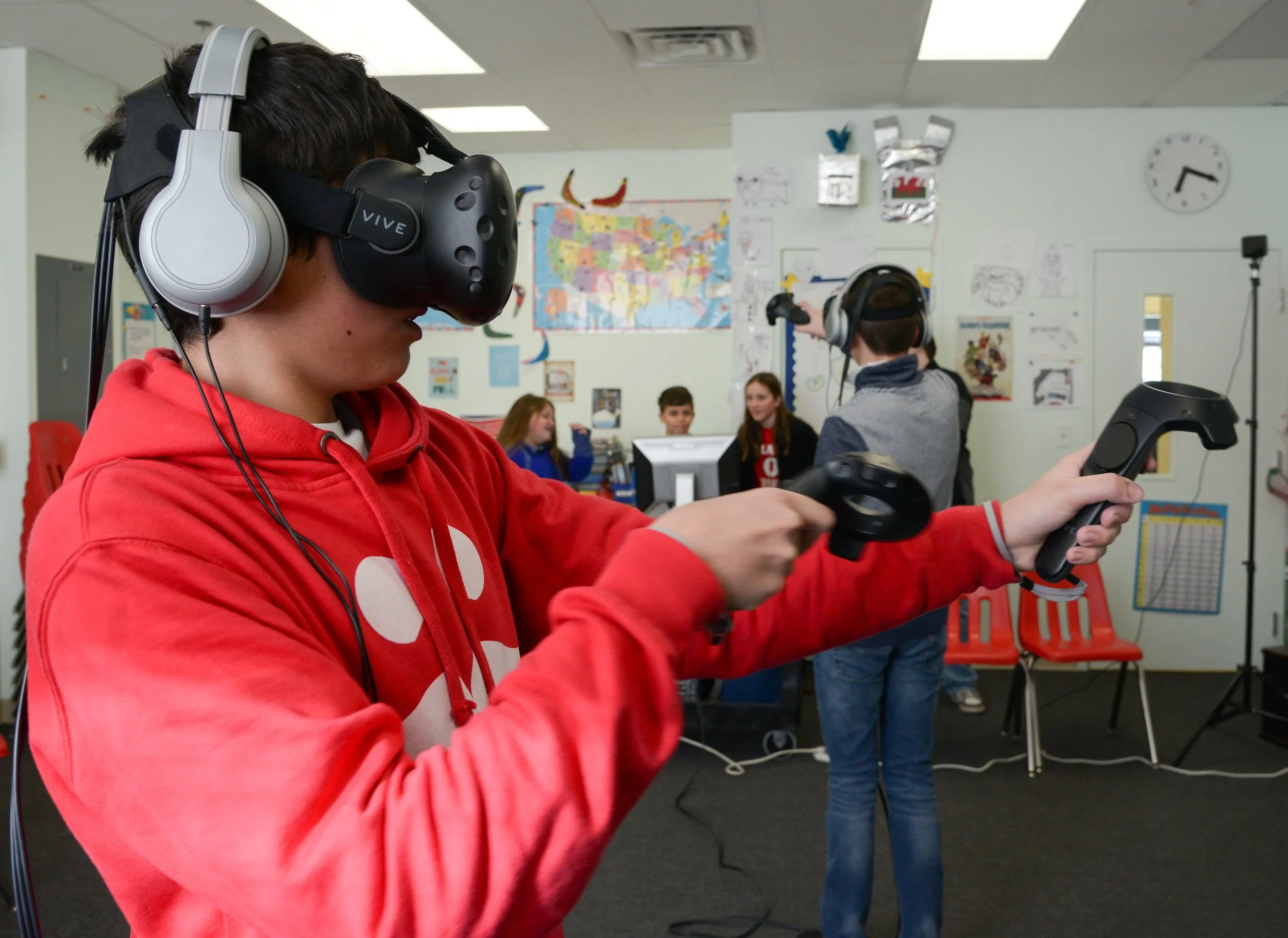 student with VR goggles, future lab Clark School