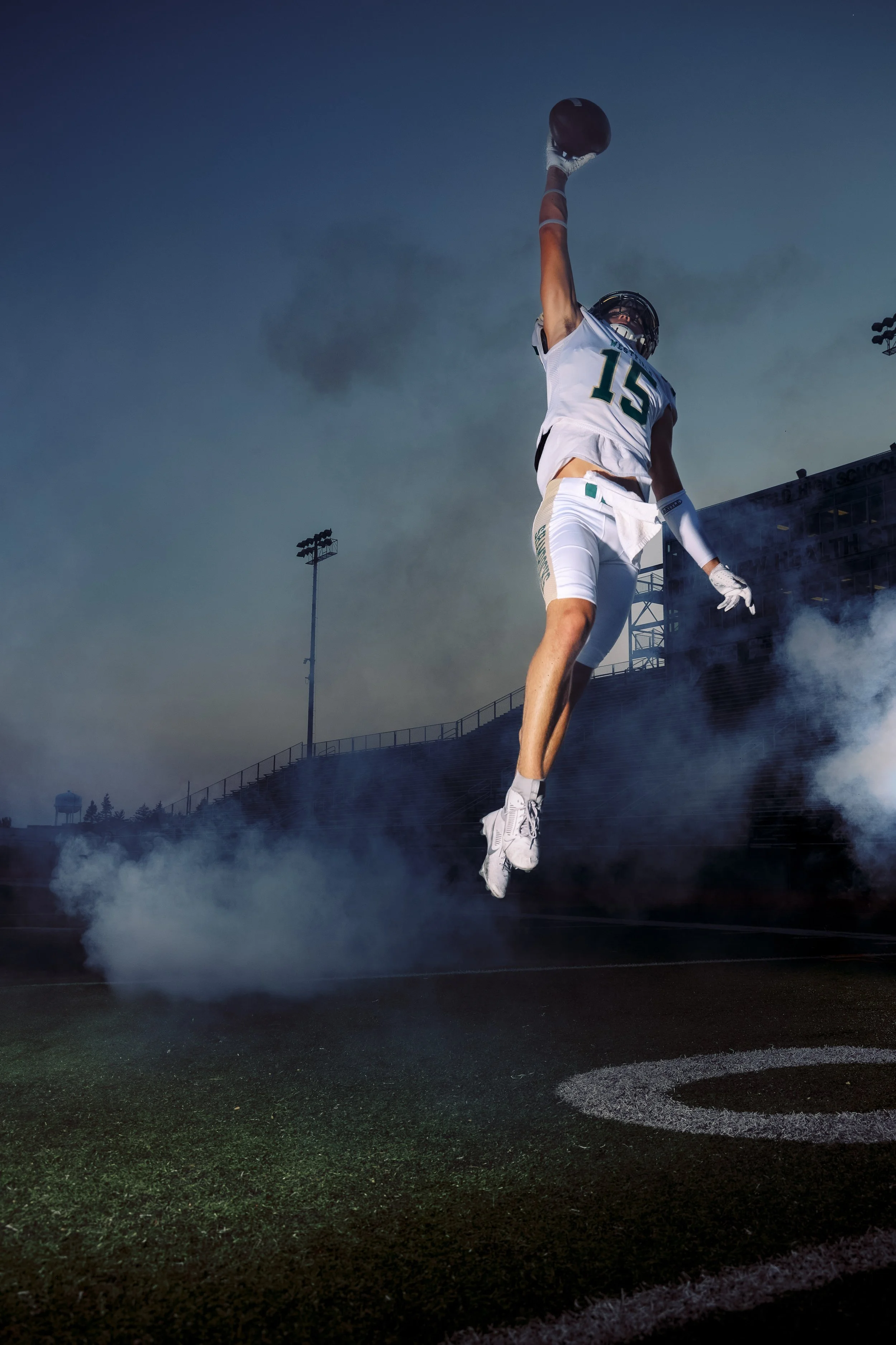 receiverjumping_footballmediaday.jpg