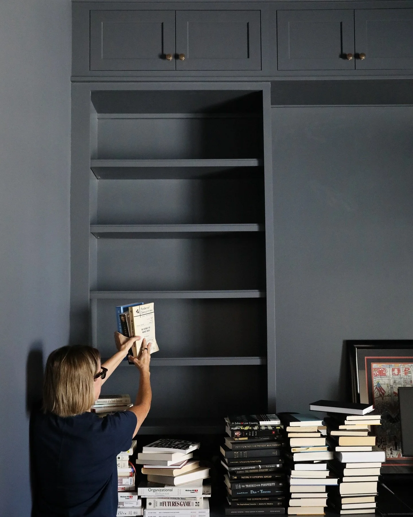 Deep black covers this sultry home office for a chic look! The built-in shelves create the perfect place to display the owner&rsquo;s books, any collectables, and add some character. We can&rsquo;t wait to show you more of this beautiful home! #Lygia