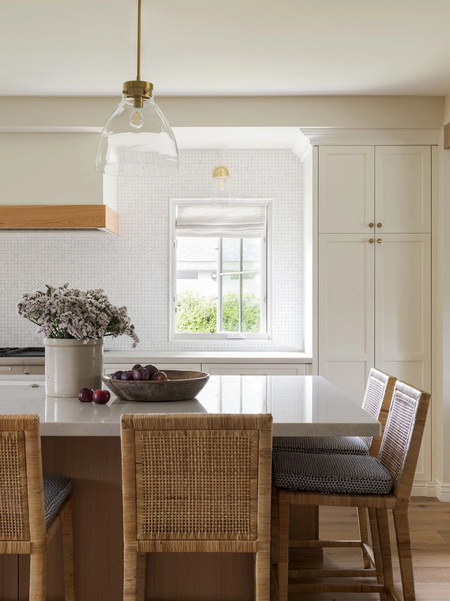 One of our favorite kitchens from our San Juan remodel project! The family of four needed a space that was light and bright but durable without sacrificing style. We love the traditional basketweave on the backsplash and the warmth of the wood with t