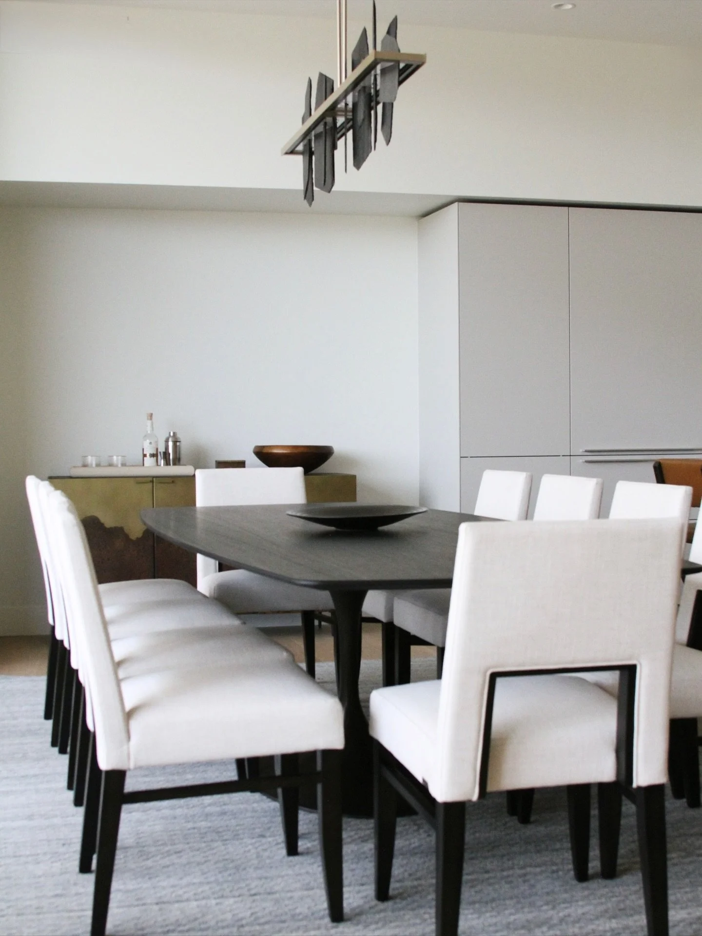 A peak into this beautiful dining area from our Phoenician flat! This space pairs clean and modern elements with the rugged desert landscape. The neutral color palette brings a grounding yet cool feel to this space. ⁠#LygiaHarkinsInteriors

#Phoenixi
