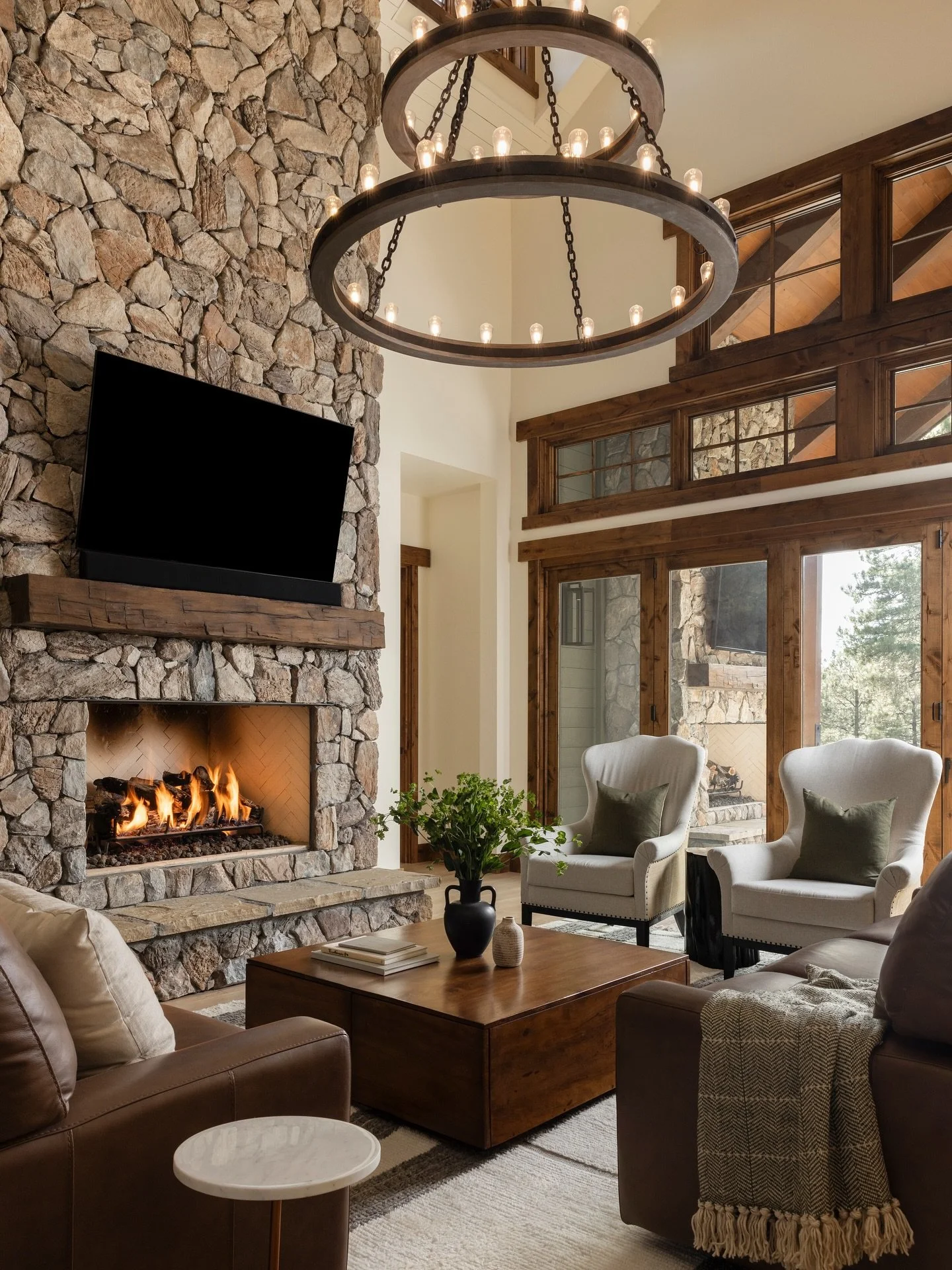 At our Pine Canyon home, the boundaries between inside and out seamlessly blend. Inspired by Flagstaff&rsquo;s serene landscape, we created a retreat that embodies relaxation. Soft, warm whites contrast beautifully with natural wood and stone, while 