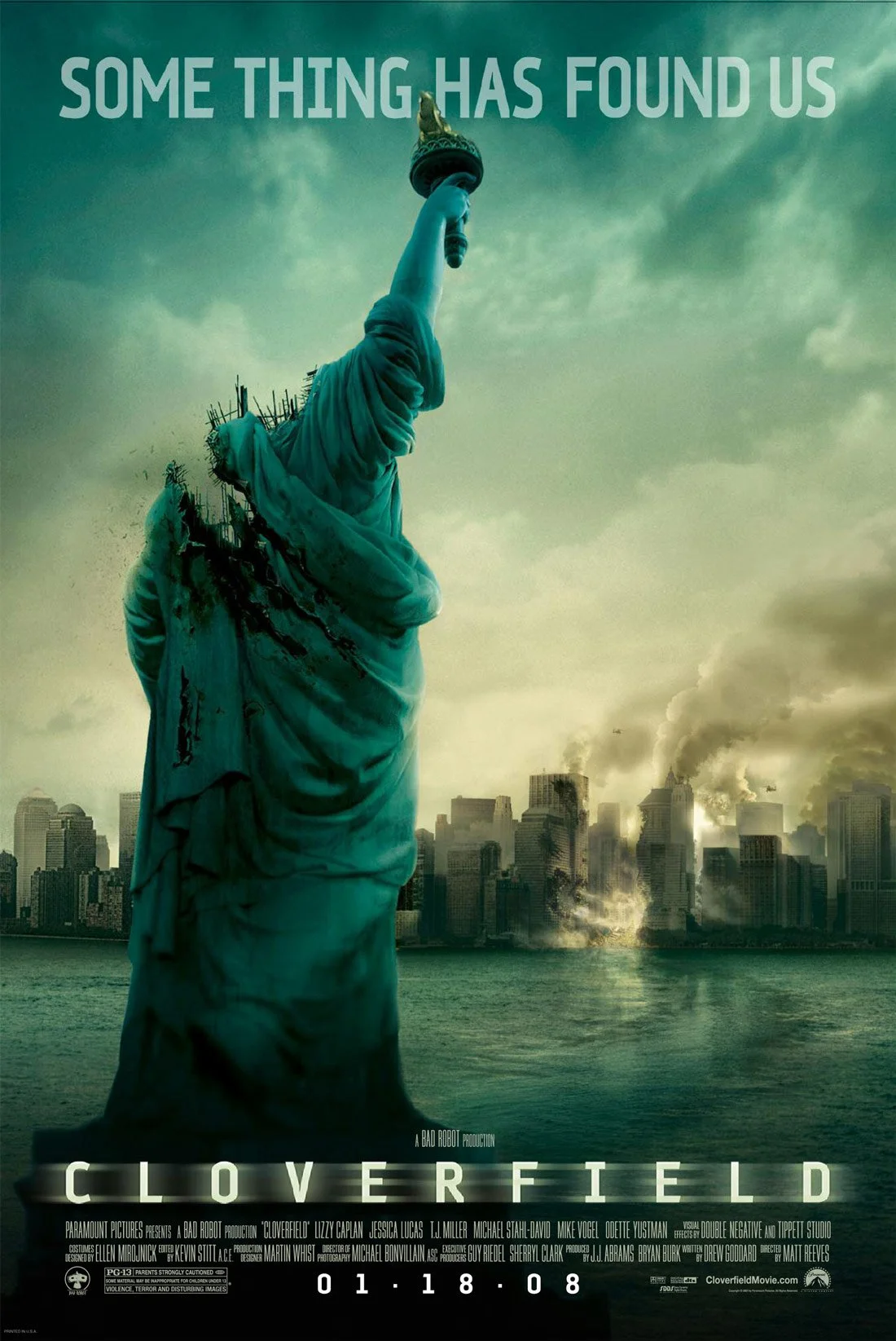 Poster for the movie 'Cloverfield' showing a damaged Statue of Liberty with a city skyline and smoke in the background, and the text 'Some Thing Has Found Us' at the top.