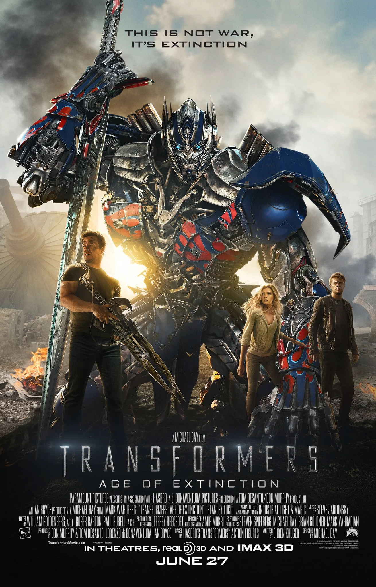 Poster for the movie 'Transformers: Age of Extinction' showing a large robot with blue and silver armor, holding a sword, and three humans standing in front of it with a war-torn background and dark cloudy sky.