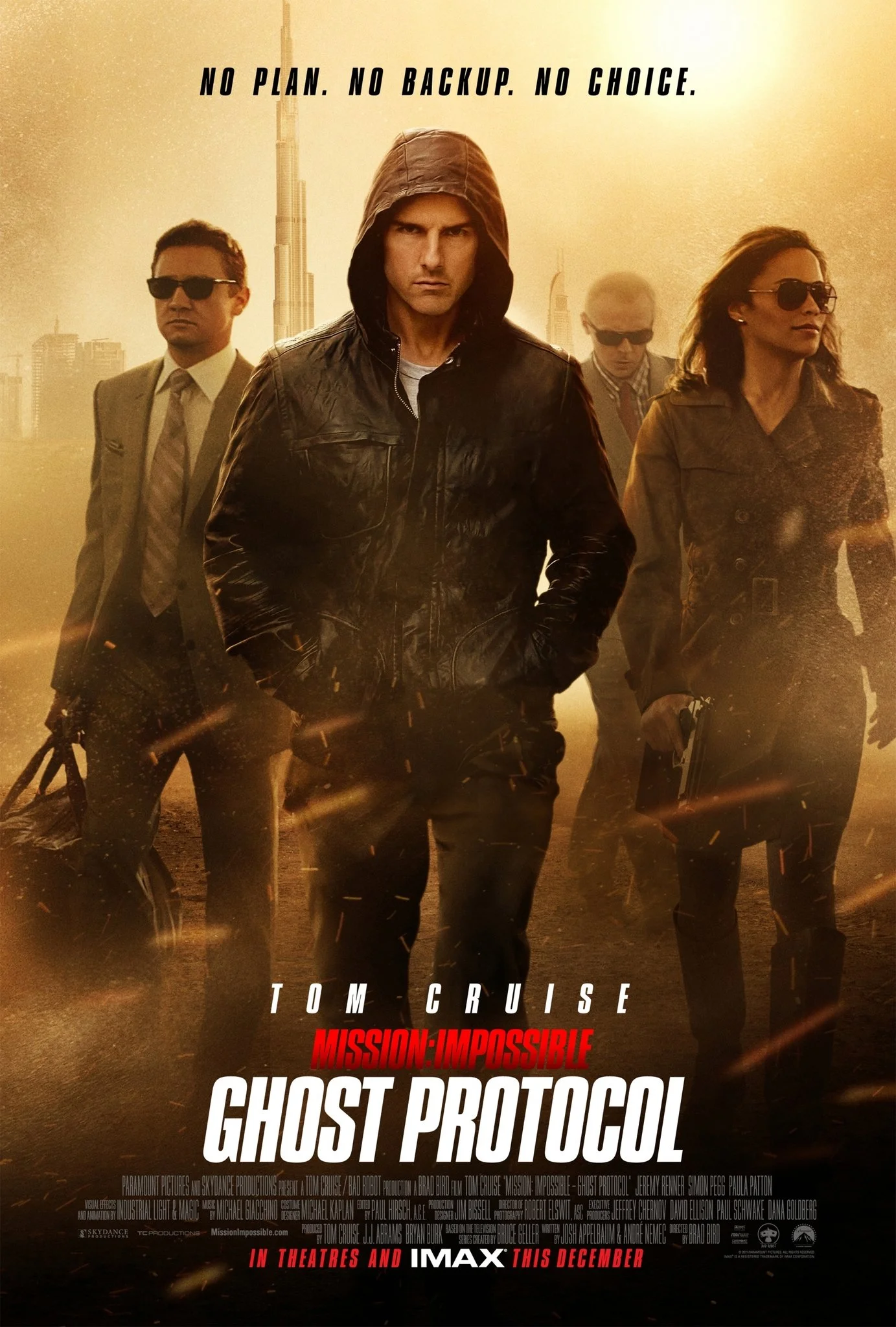 Movie poster for 'Mission: Impossible - Ghost Protocol' features Tom Cruise in a black leather jacket with a hood, flanked by four other characters wearing sunglasses. The background shows a city skyline, the tagline reads 'No Plan. No Backup. No Cho