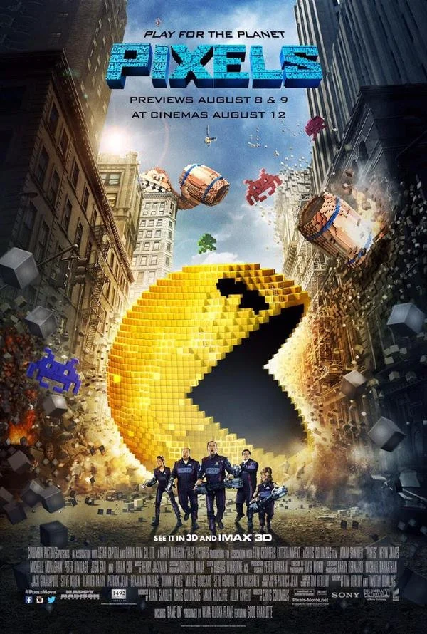 Movie poster for 'Pixels' featuring a giant pixelated Pac-Man consuming buildings, with video game characters and objects flying through a city street, and a team of five people in the foreground.
