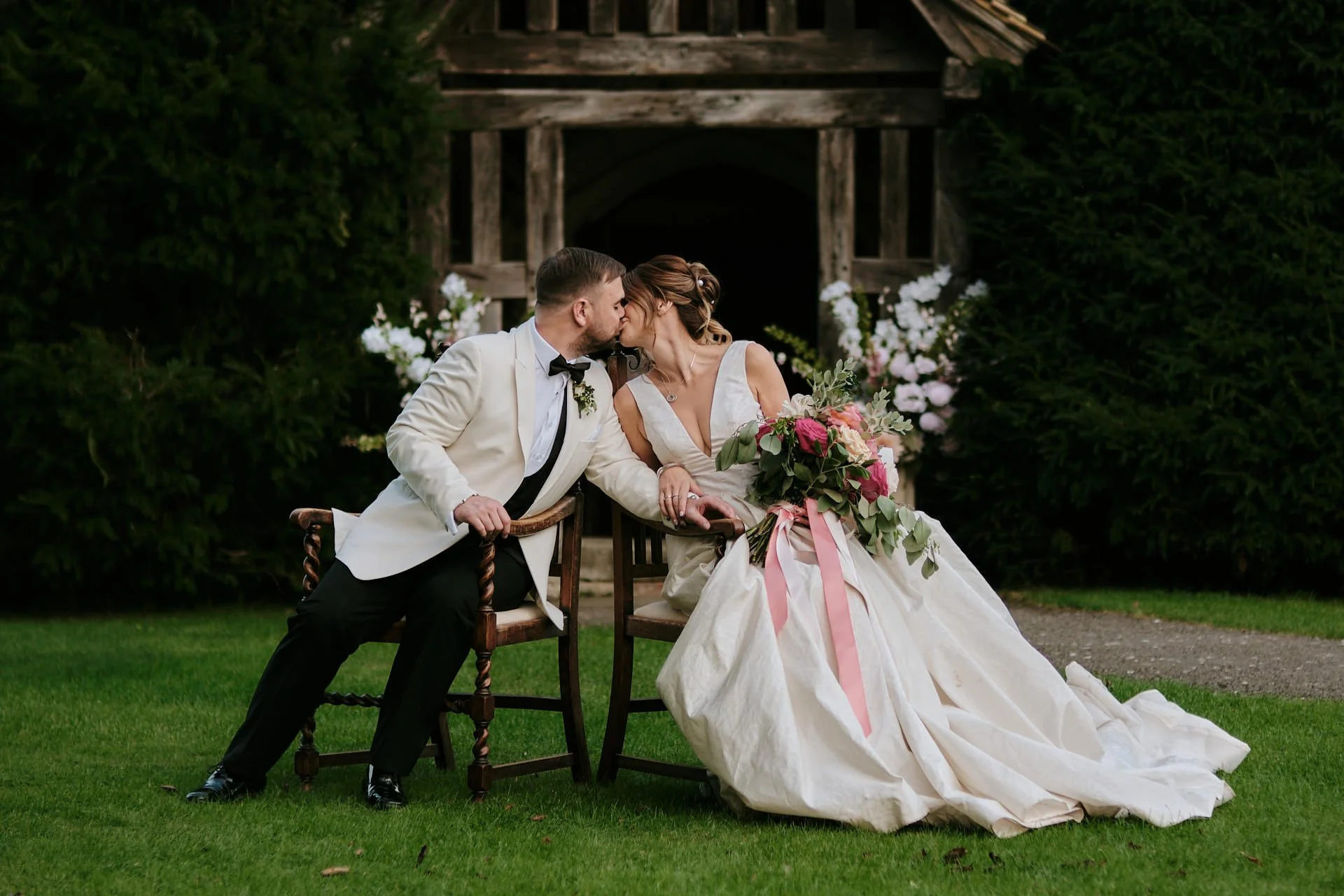 a couple kiss at bilsington priory wedding venue styled shoot