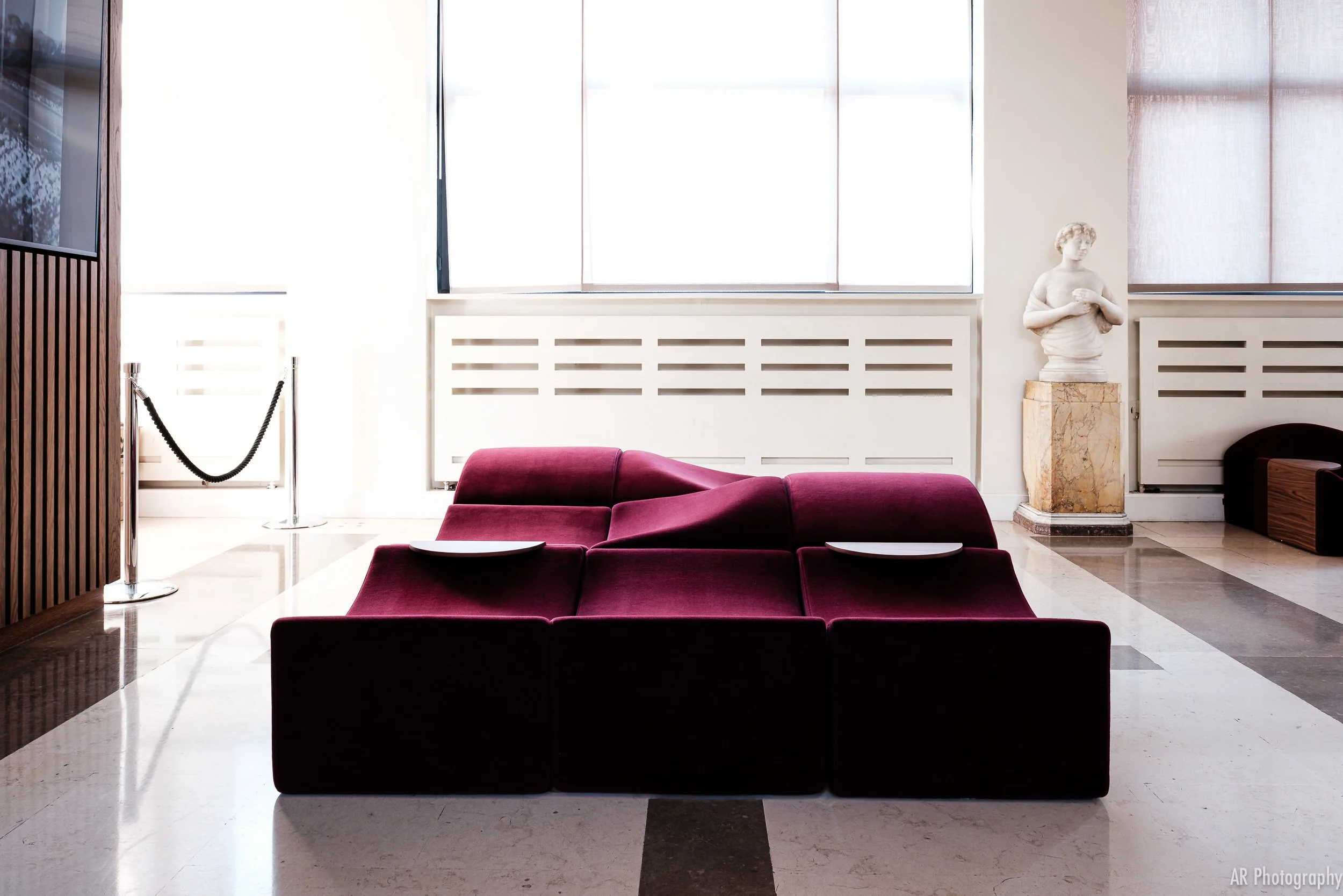 a display of Asmara seating from Ligne Roset in the entrance of the French Institute London