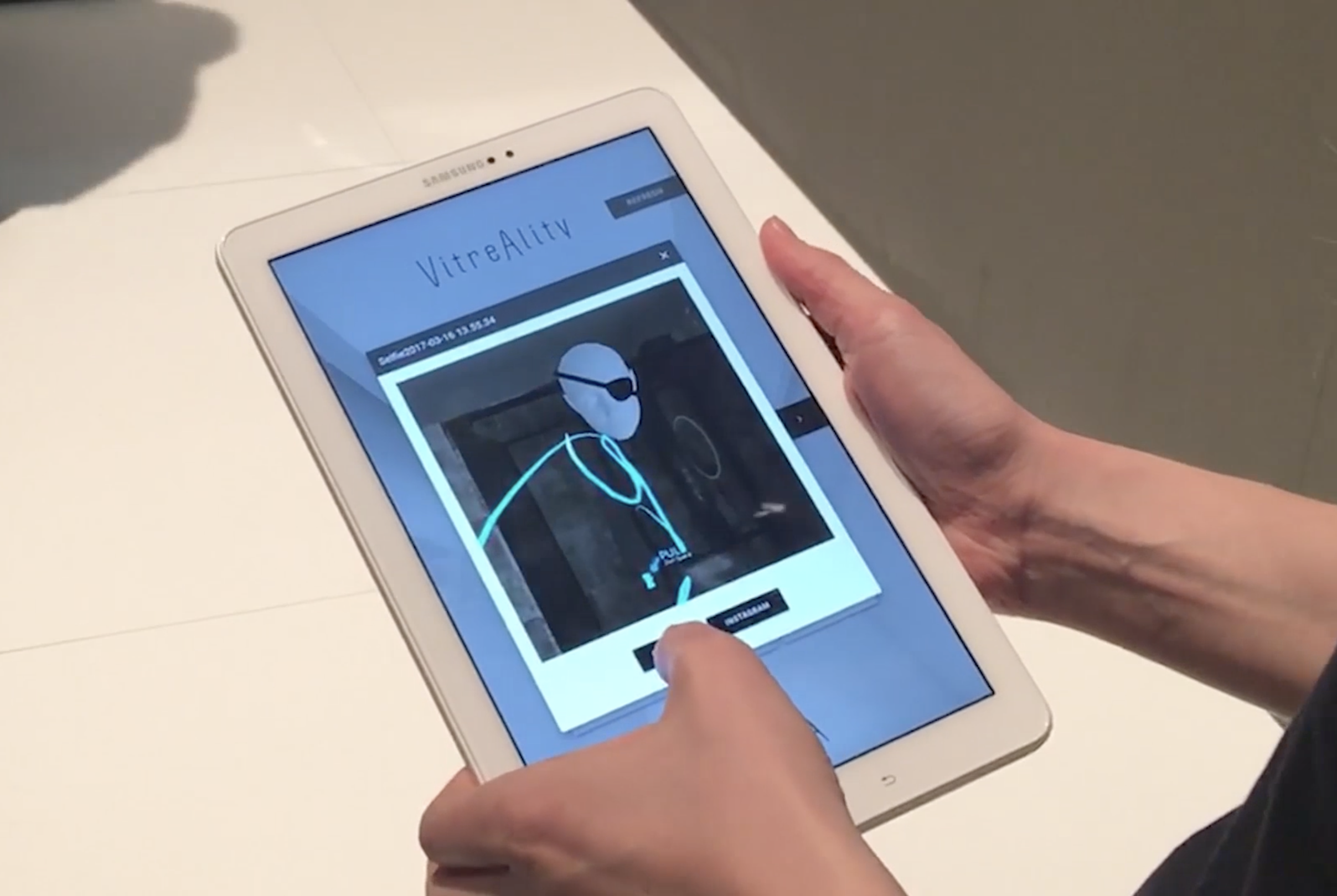 The Virtual Selfie captured from the mirror is sent to the tablet application; which then can be shared on social media or by email.