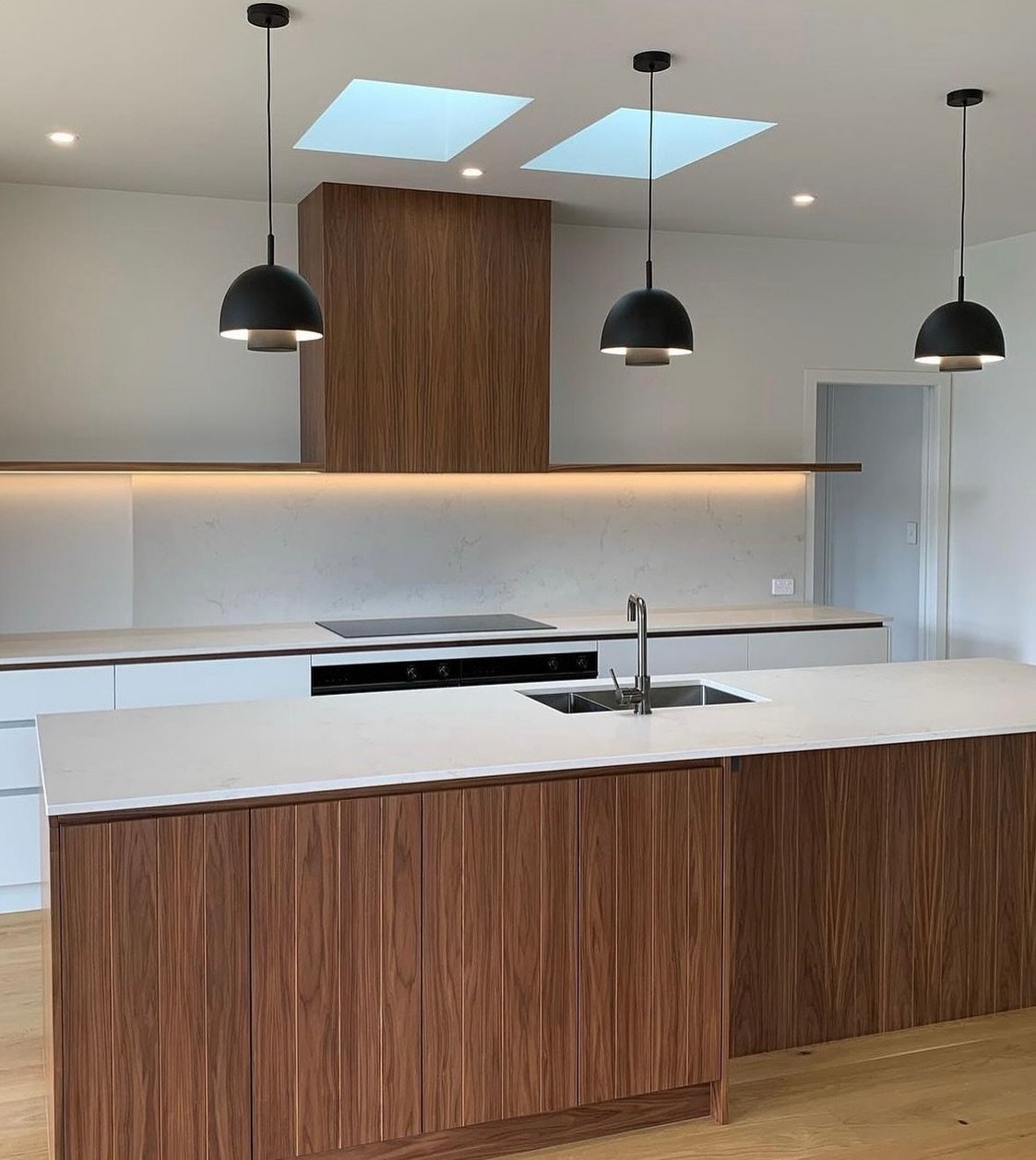Taking a stroll down memory lane with this timeless walnut veneer T&amp;G kitchen design (and my early rendering attempts! 😅)

Swipe to see how the initial vision compares to the final product. 

Cabinet maker: @manolasbrosnz