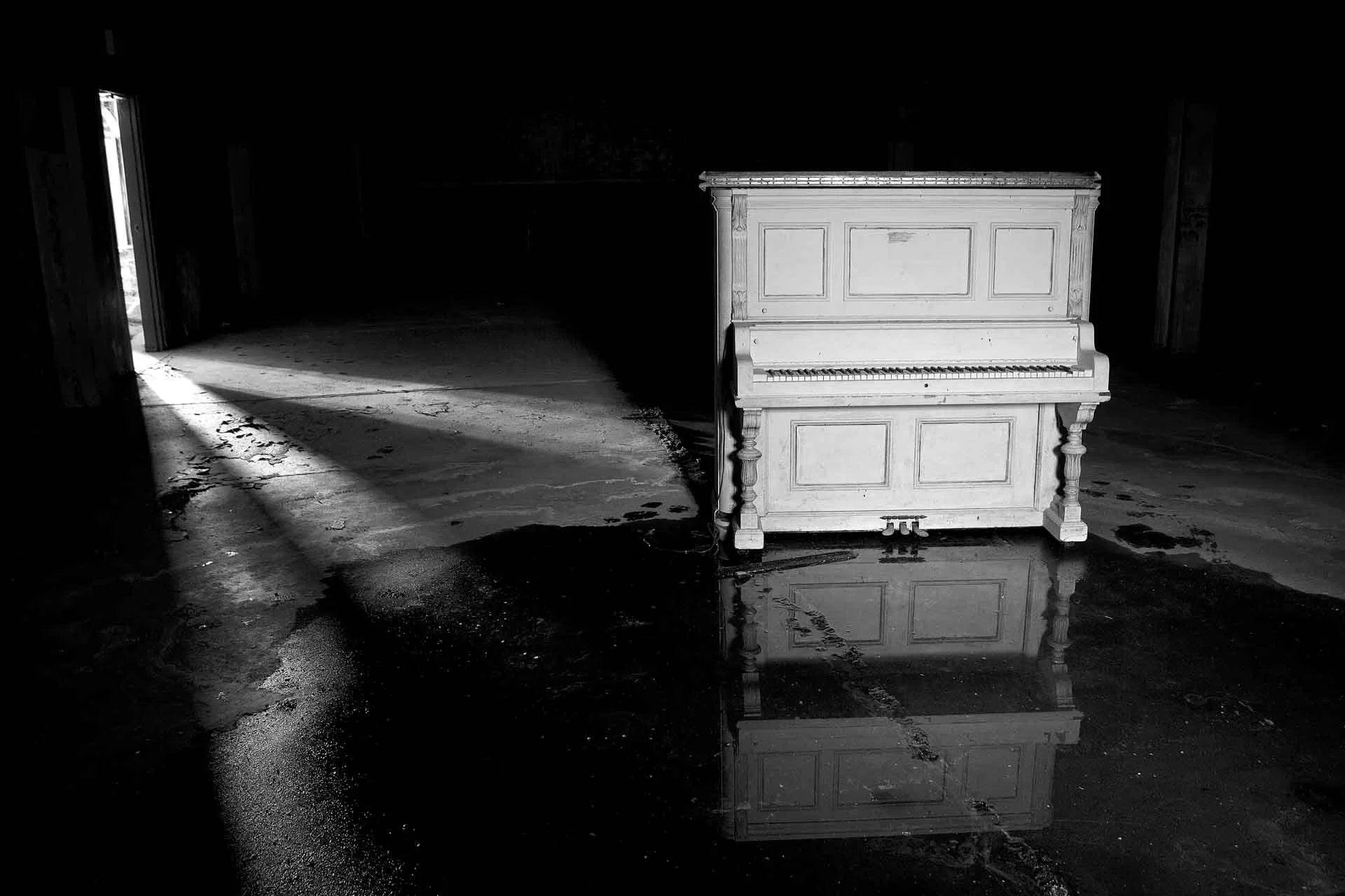 White Piano in Abandoned Building