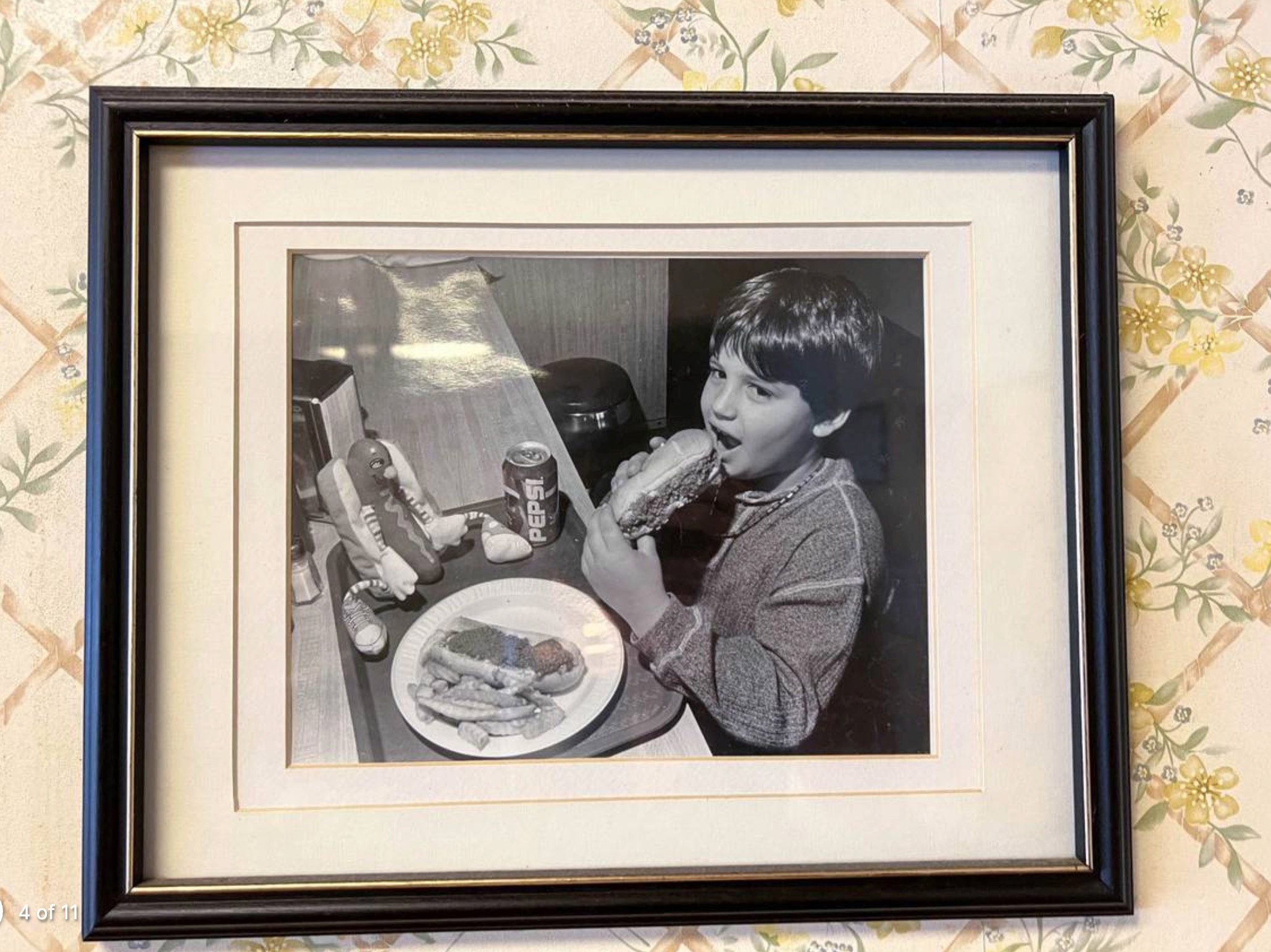  Nick Sikiodtis is immortalized on the wall in this photo when he was a child eating at Green’s Lunch in Uptown Charlotte. Photo by Alex Cason , CharlotteFive.  
