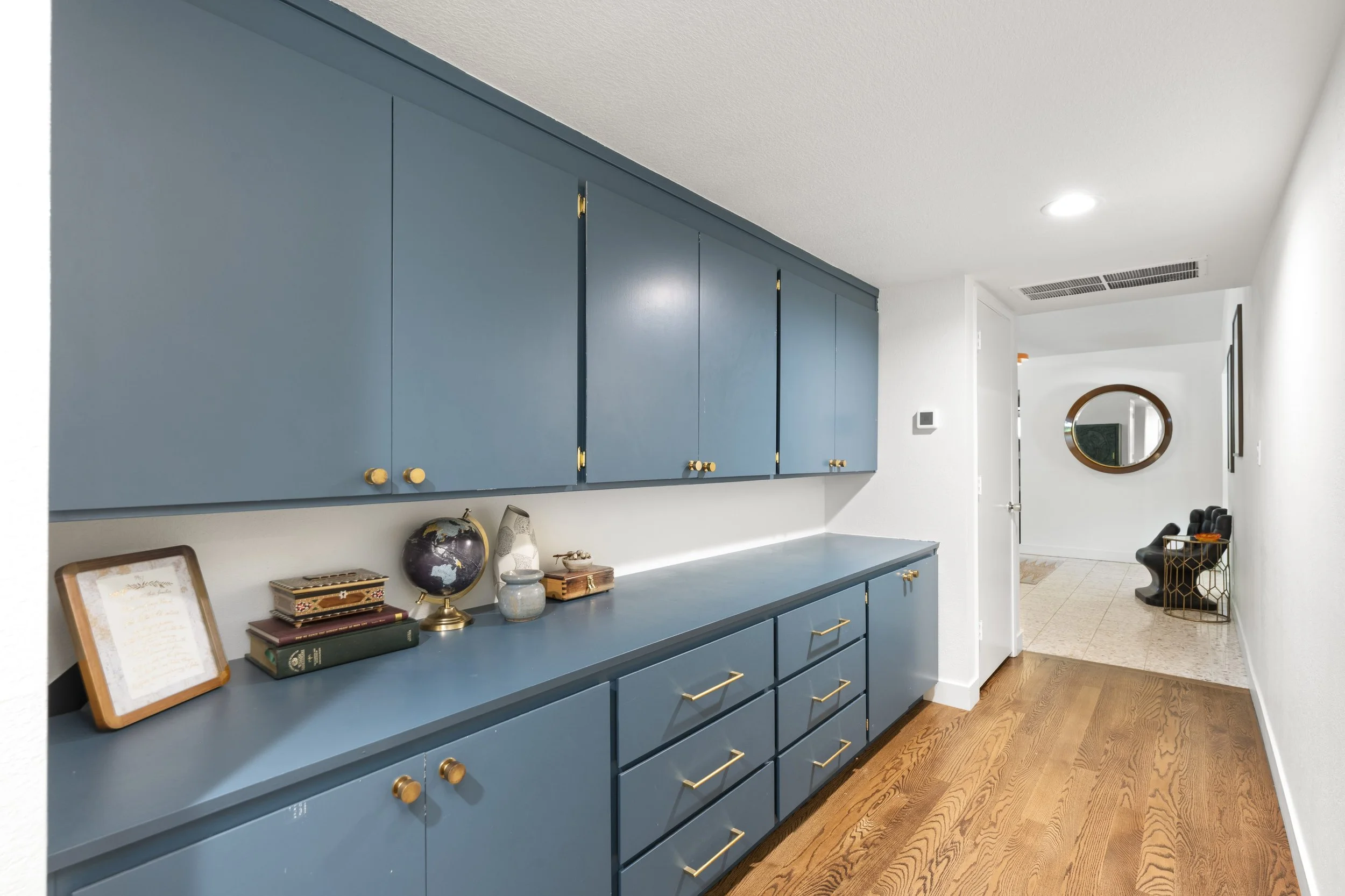 Site-finished white oak hardwood flooring throughout the home