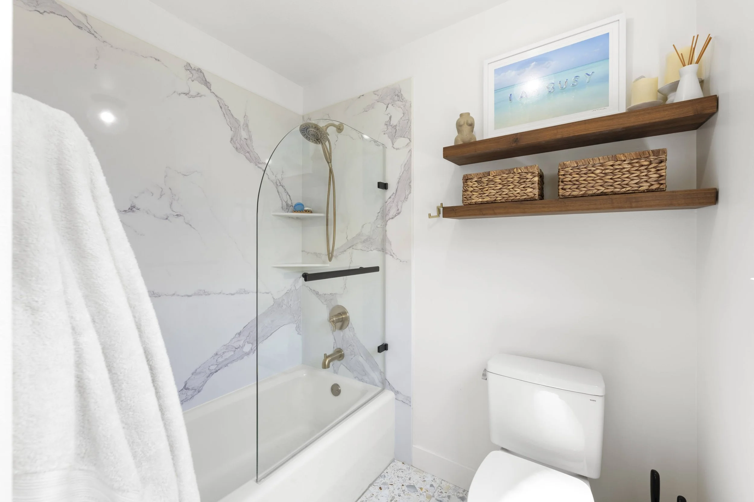 Updated bathroom with solid surface shower walls