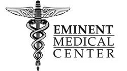Eminent Medical Center logo featuring a caduceus symbol