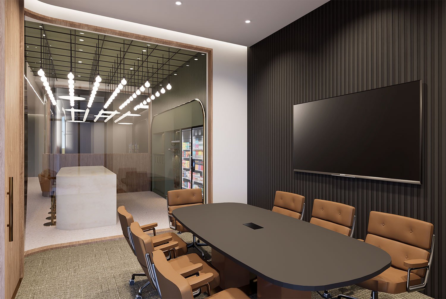 Modern conference room with a black wall, a large TV, and a black oval table surrounded by tan chairs. There is a glass-walled lounge area with a white marble counter and a vending machine in the background. A chandellier with multiple lights hangs f