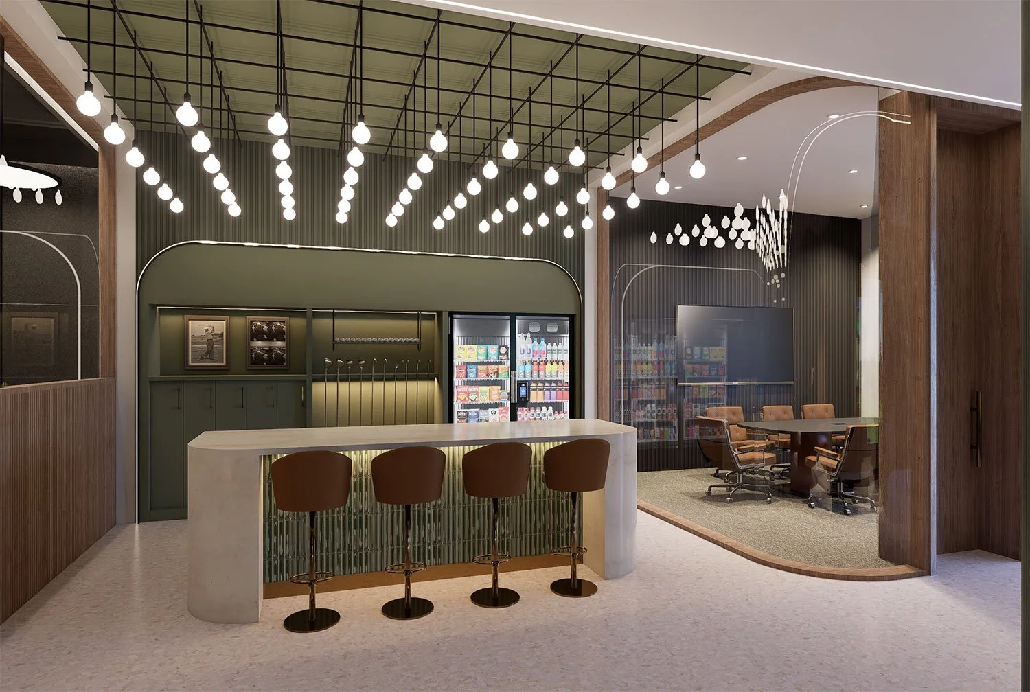 A modern office lounge area with a bar counter, bar stools, and a snack vending machine, illuminated by hanging globe lights and featuring a meeting area with chairs and a large screen.