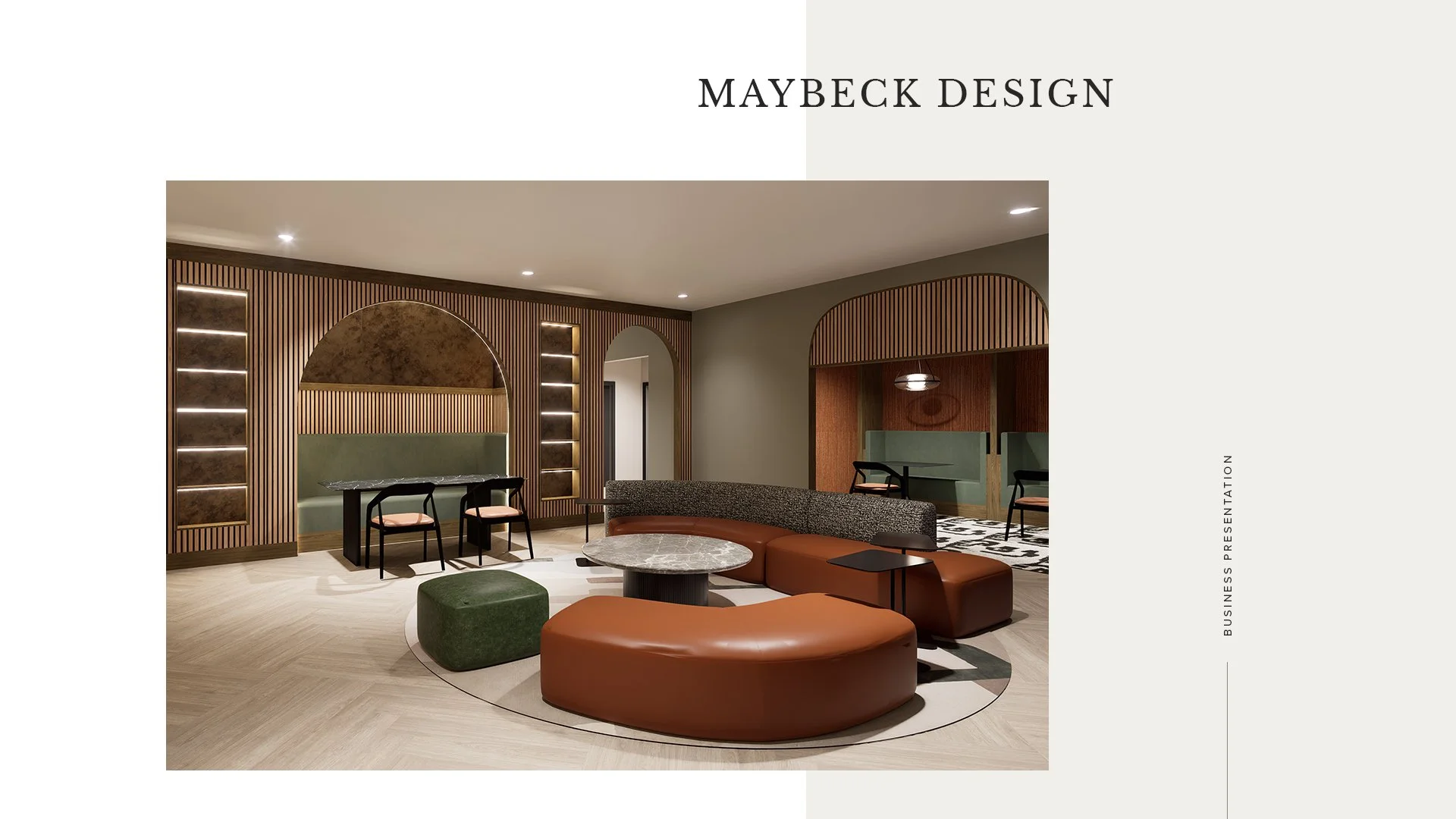 Modern interior with curved seating, marble table, and wood panel walls in a lobby or lounge area.