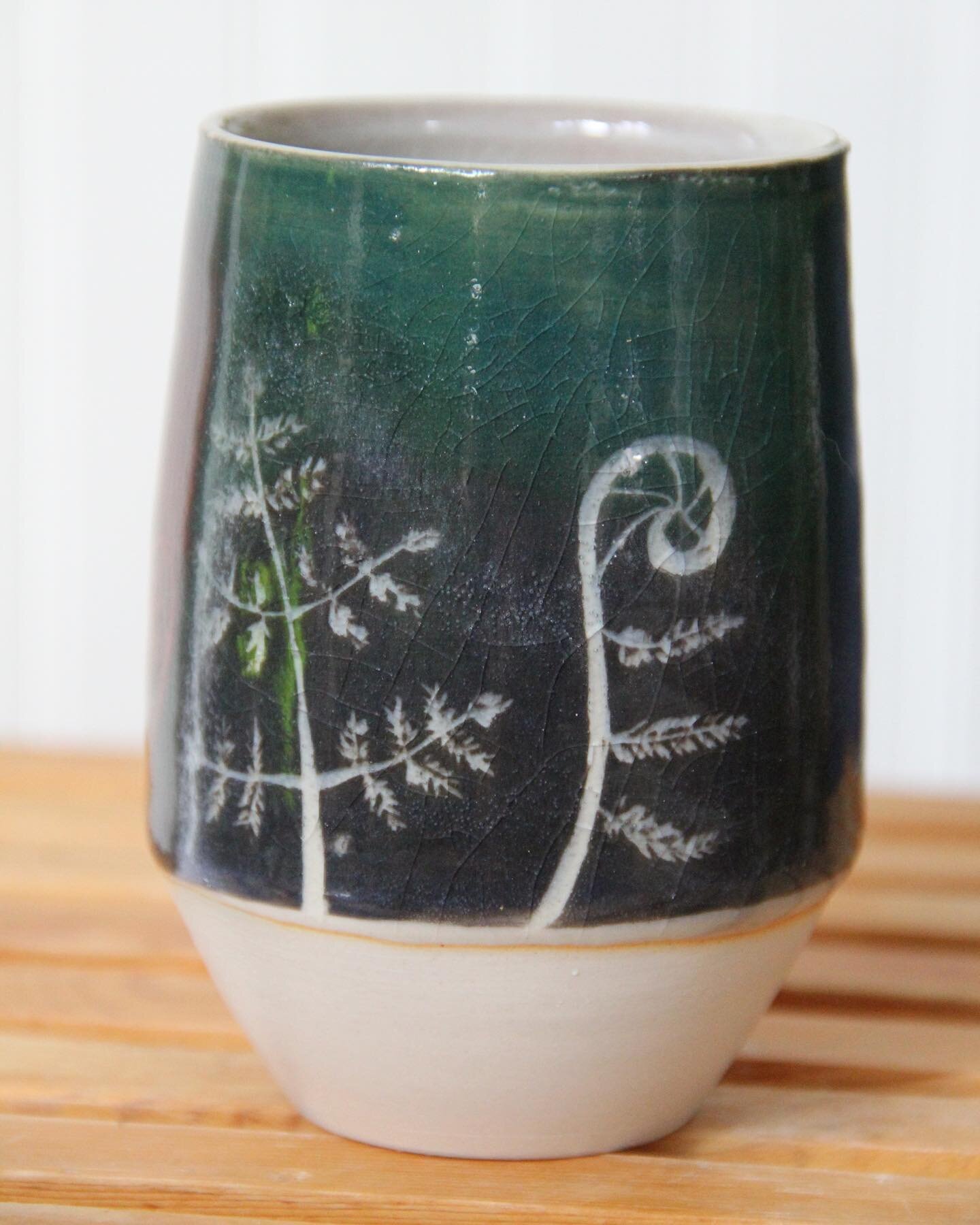 My little fern cup. 

I used a technique called sgraffito to create these fern babies, which essentially entails painting on layers of colorful and very wet clay, waiting for it to dry, and then carving designs into it. It&rsquo;s a very satisfying p