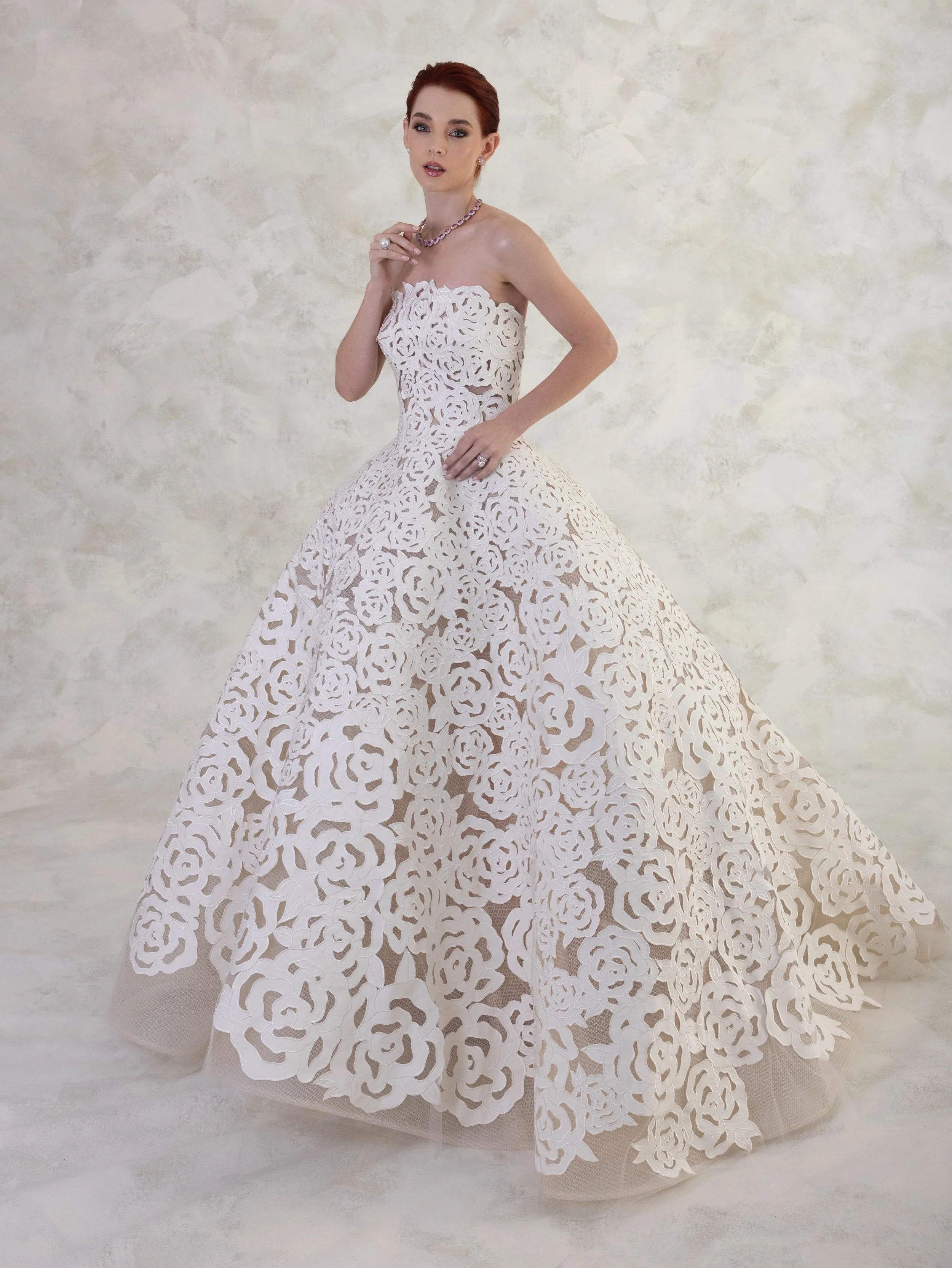 An icon, the incredible Oscar de la Renta Rosette gown, only available at Helen Rodrigues.