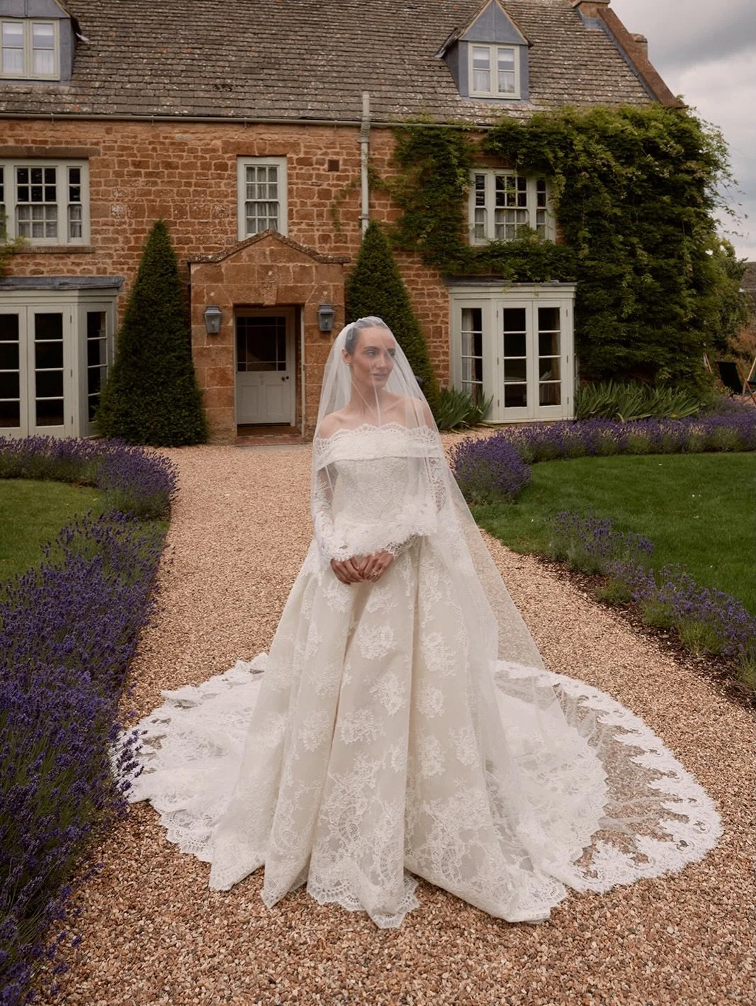 An ode to ethereal elegance, @livvperez stuns in the Elie Saab lace ball gown, adorned with intricate embroidery and paired with a cathedral veil for an unforgettable bridal moment. Captured by @benjaminwheeler. 
Only available at Helen Rodrigues Bri
