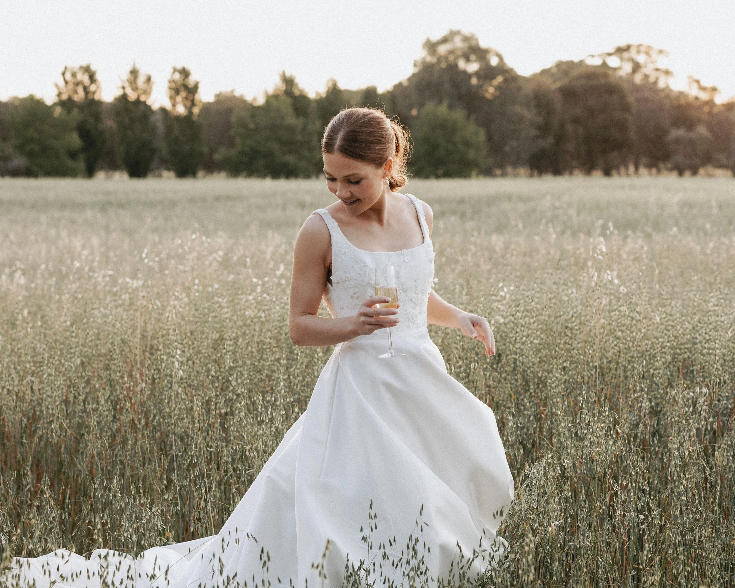 Sophie wearing bespoke Suzanne Neville