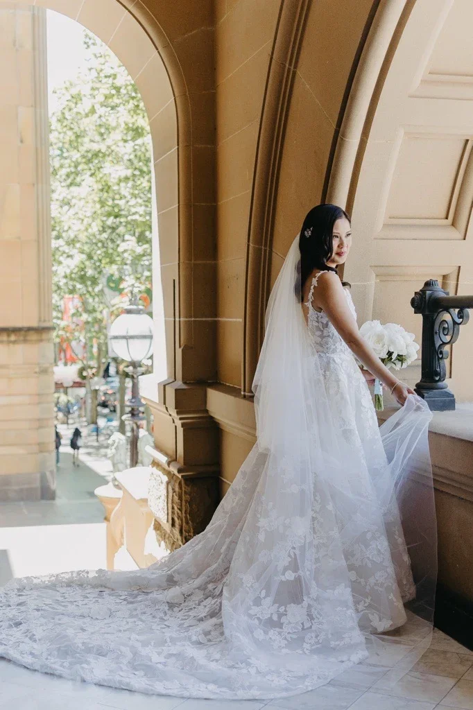 Jennifer wearing Monique Lhuillier