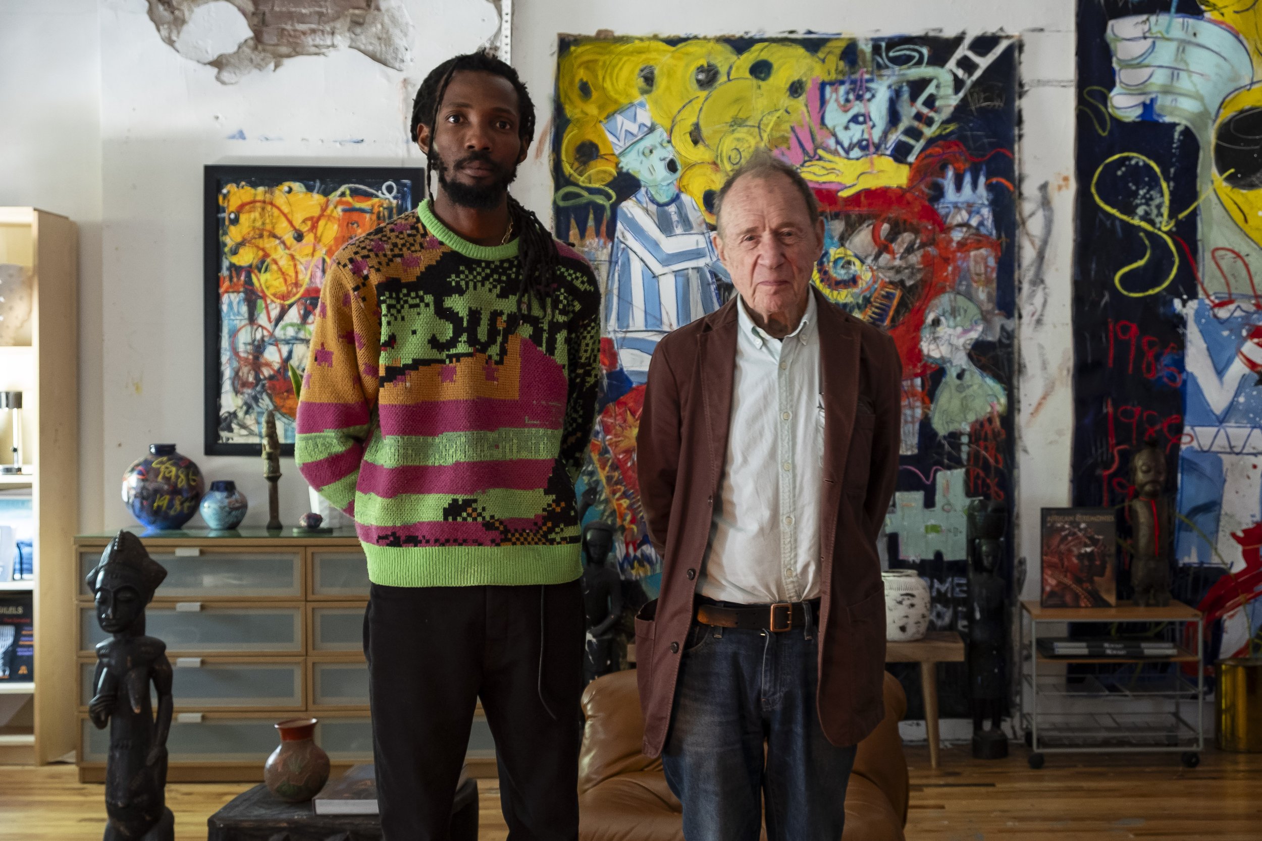 Moyo being interviewed by Anthony Haden-Guest for Whitehot Magazine, 2024