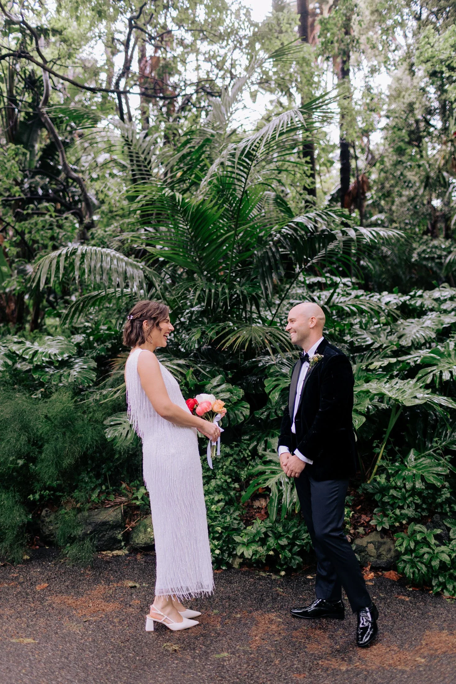 Max and Alex sharing their first look before their wedding ceremony at Old Palm Liquor in Melbourne.
