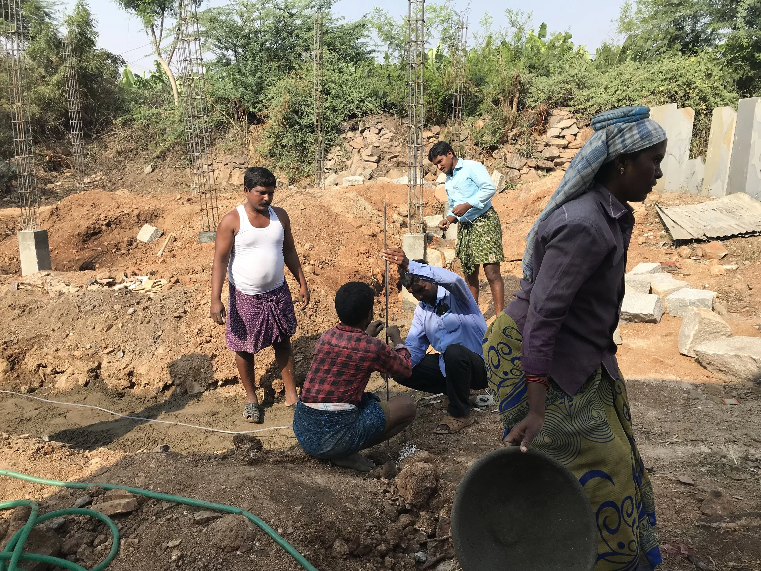 Setting up concrete columns on site