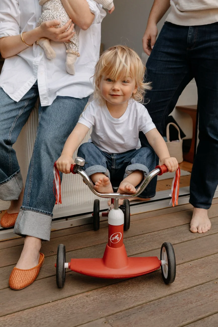family-portraiture-child-on-bike.001.jpg