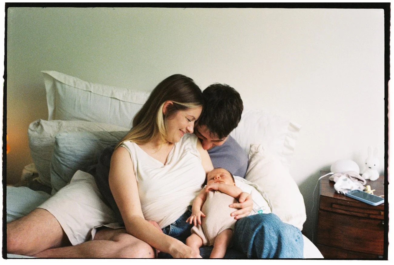 family-portraiture-mother-father-newborn-laughing.002.jpg