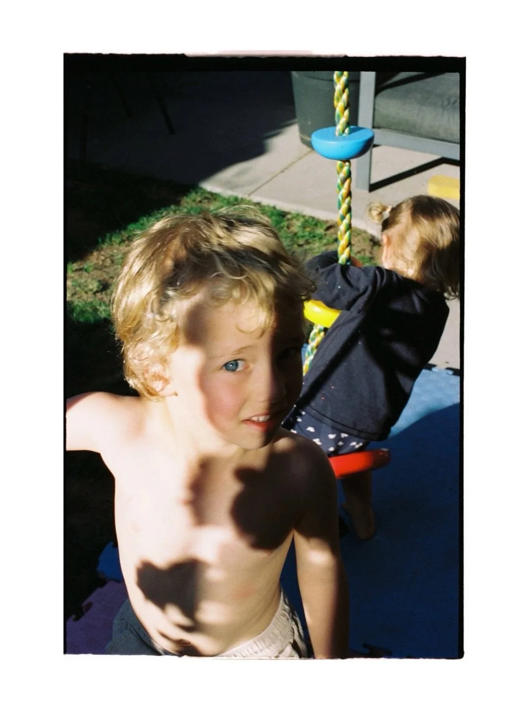 Kids in the back yard of suburbia.

Process and scanning by @ikigaifilmlab 🙏🏻

-

Rochelle Tissa is a Melbourne-based photographic artist working across film and digital photography. Her practice explores womanhood, family ritual, and the rhythms o