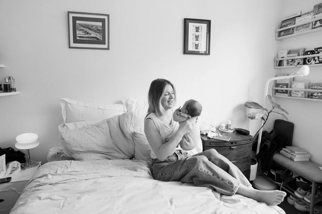 family-portraiture-mother-newborn-laughing.001.jpg