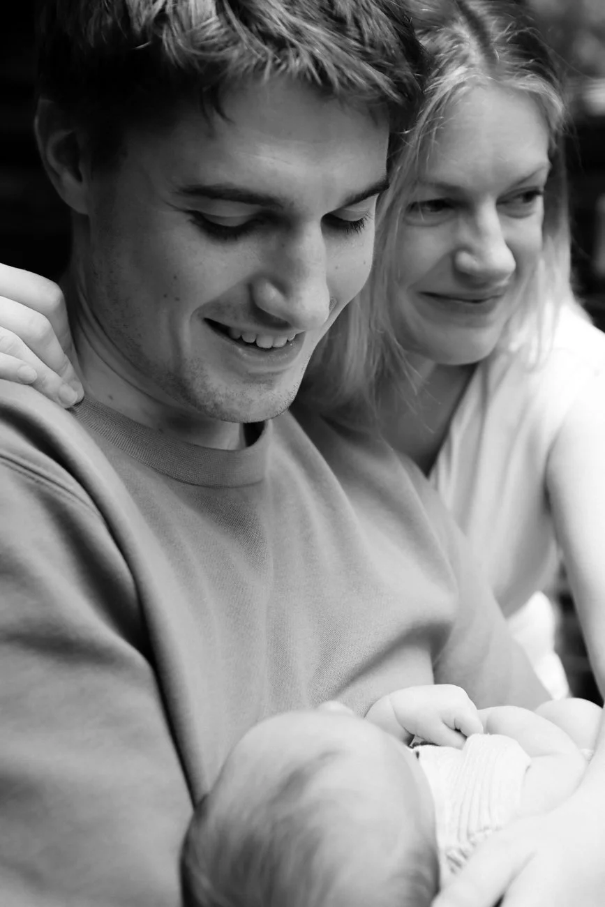 family-portraiture-mother-father-with-newborn-courtyard.002.jpg