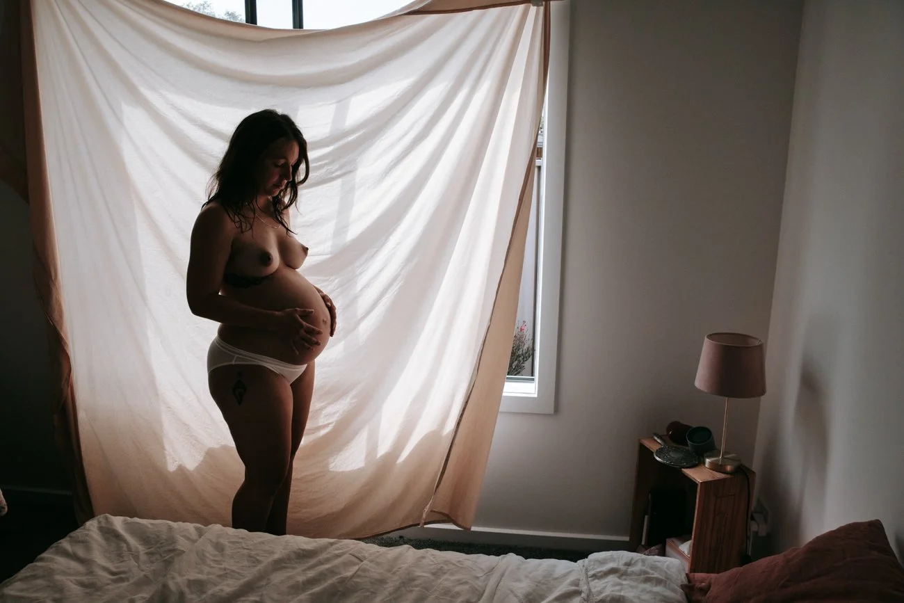 family-portraiture-pregnant-mother-curtain.001.jpg