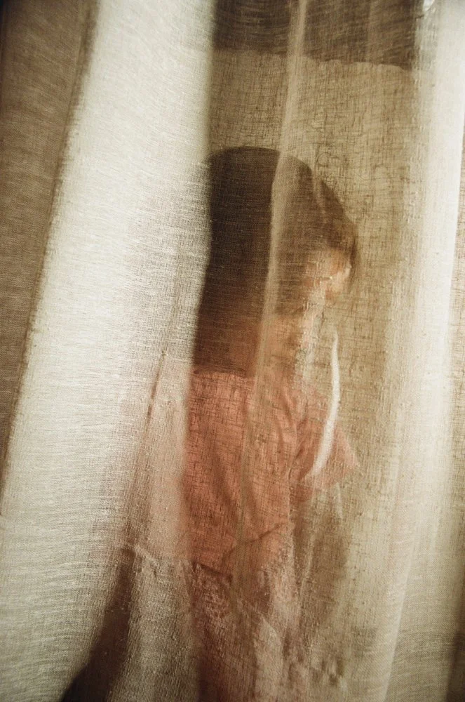 everyday-exotic-child-behind-curtain.jpg.jpg