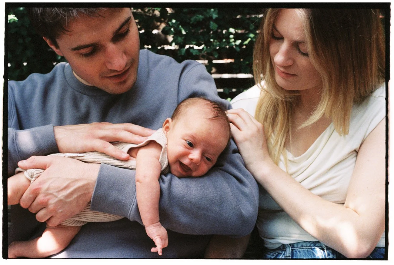 family-portraiture-newborn-in-parents-arms.003.jpg