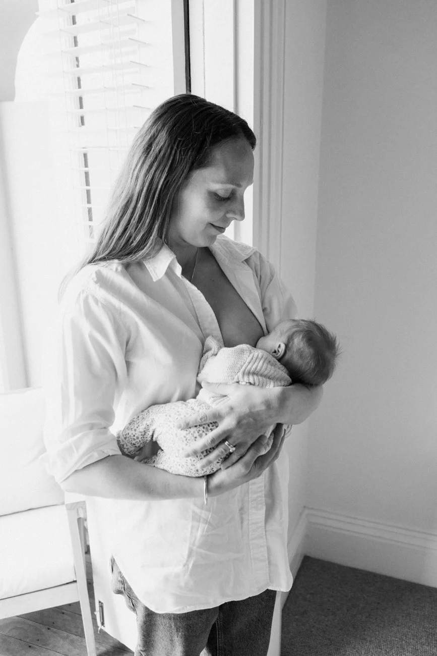 family-portraiture-mother-standing-breast-feeding-baby.001.jpg