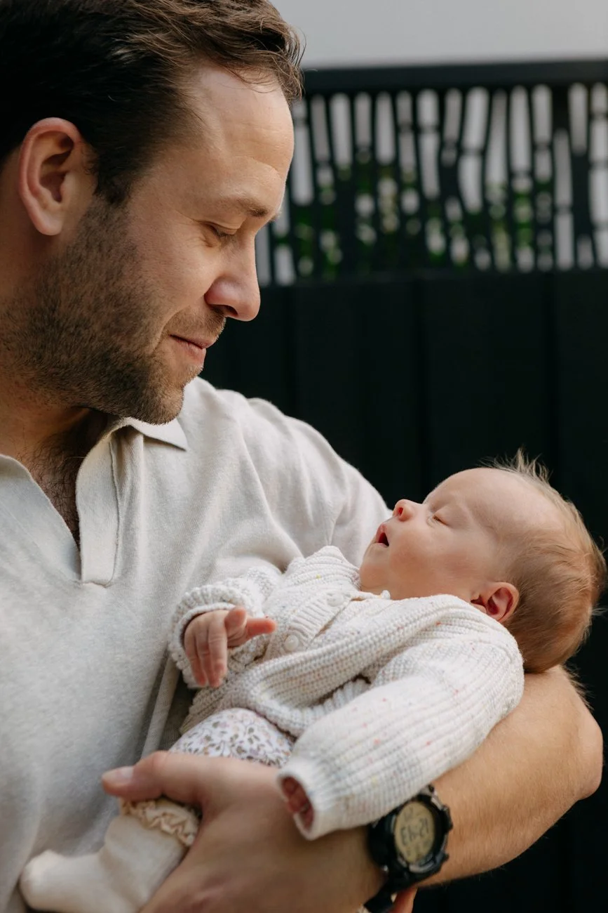 family-portraiture-father-holding-baby.001.jpg