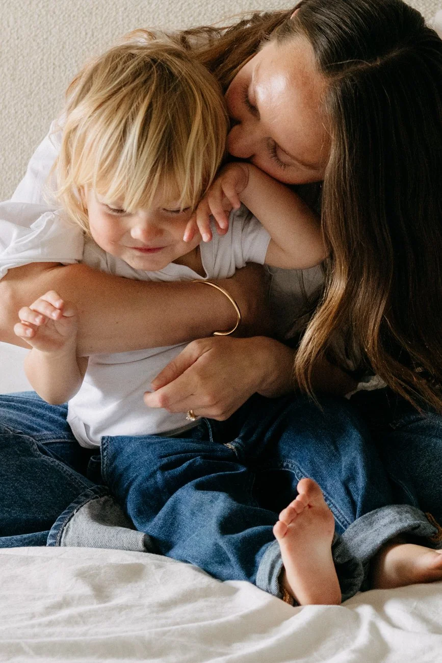 family-portraiture-mother-cuddling-son.002.jpg