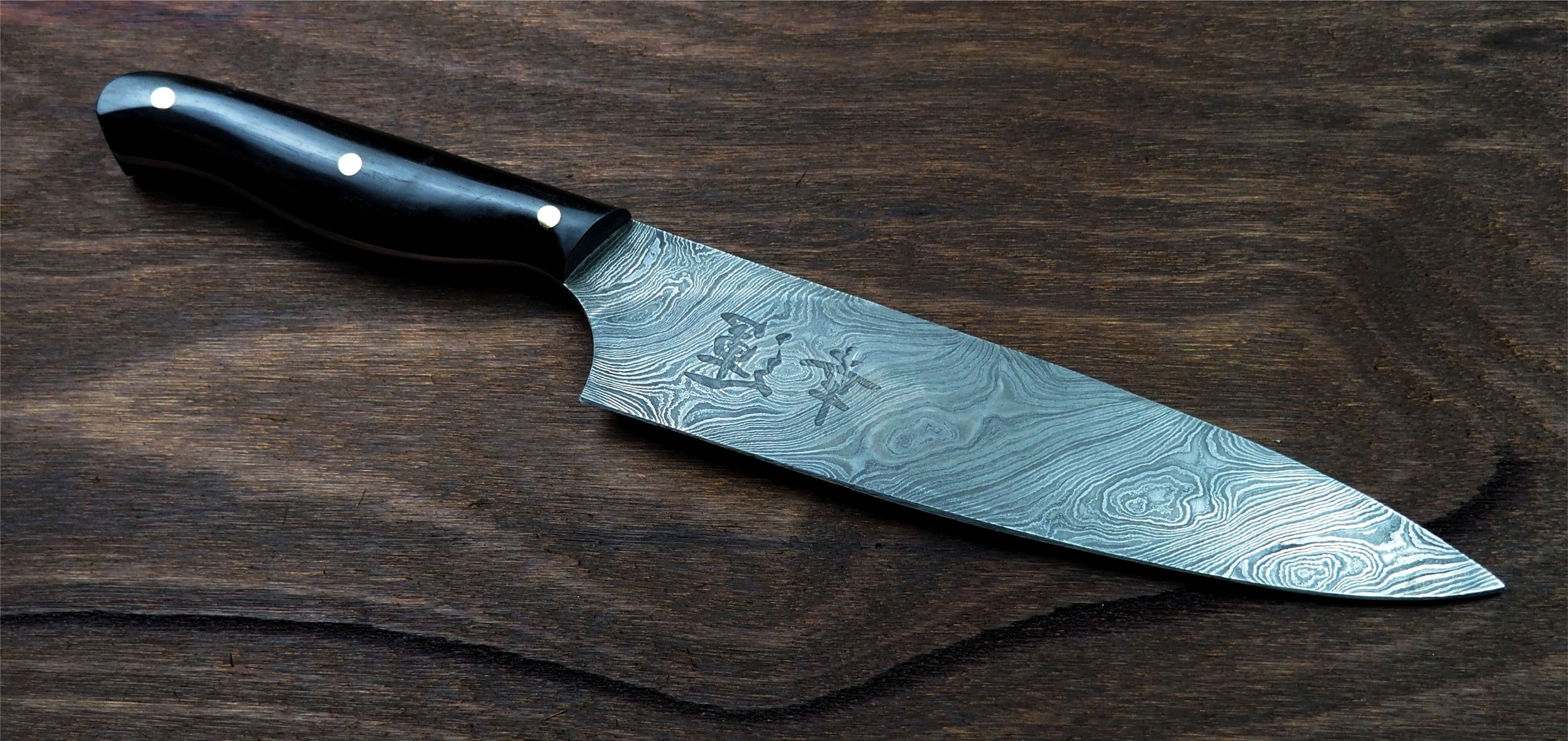 MADAGASCAR BLACK EBONY SPIRAL DAMASCUS CHEFS KNIFE 1.jpg