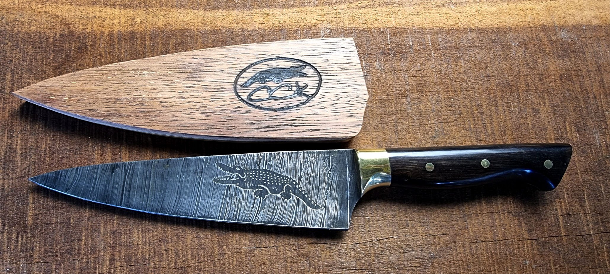 SPIRAL DAMASCUS EBONY CHEF KNIFE.jpg